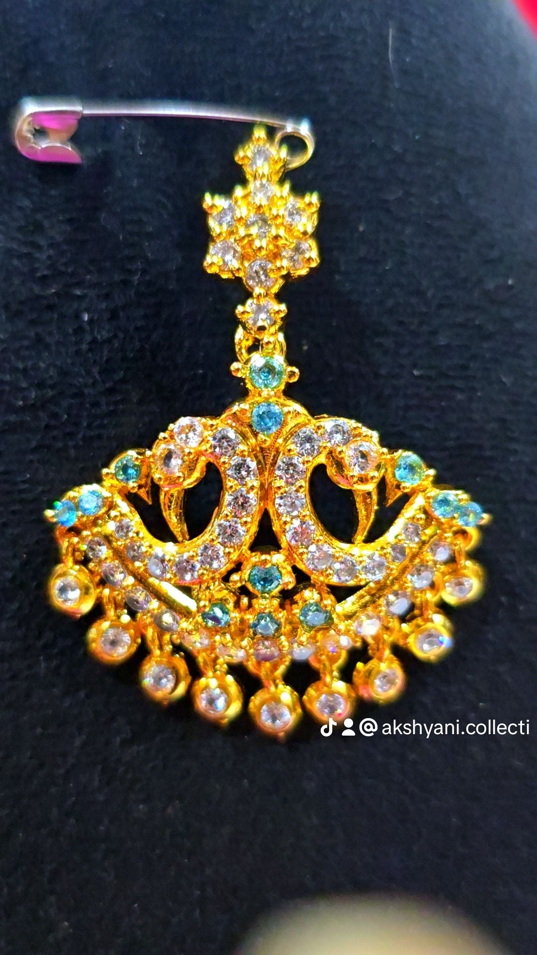 Peacock aqua blue aatil.Not 916 gold. Code 776