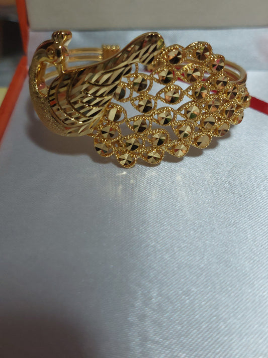 . Adjustable Peacock bangle not 916 gold. A432