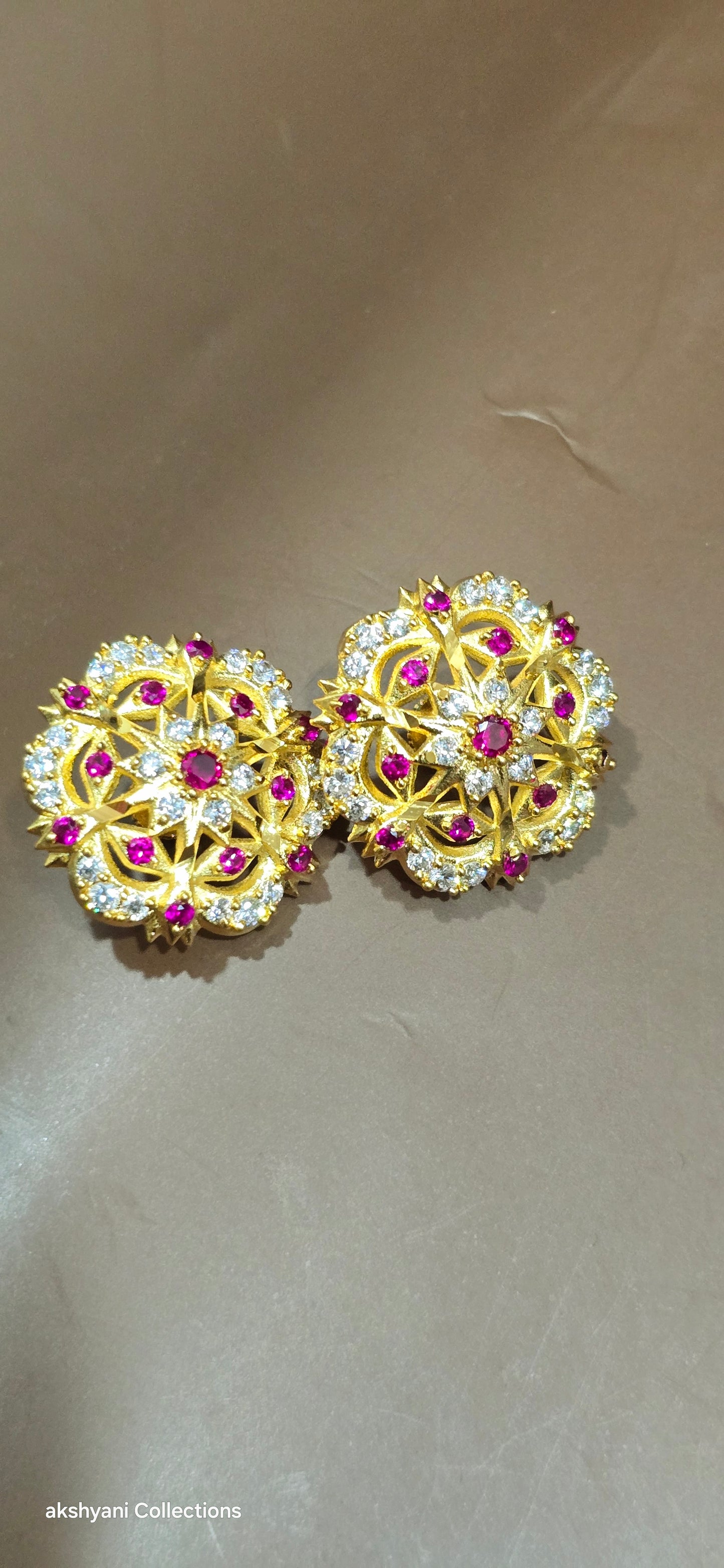 Diamond cut Ruby head earrings . Not 916gold. Indian screw . Code 809