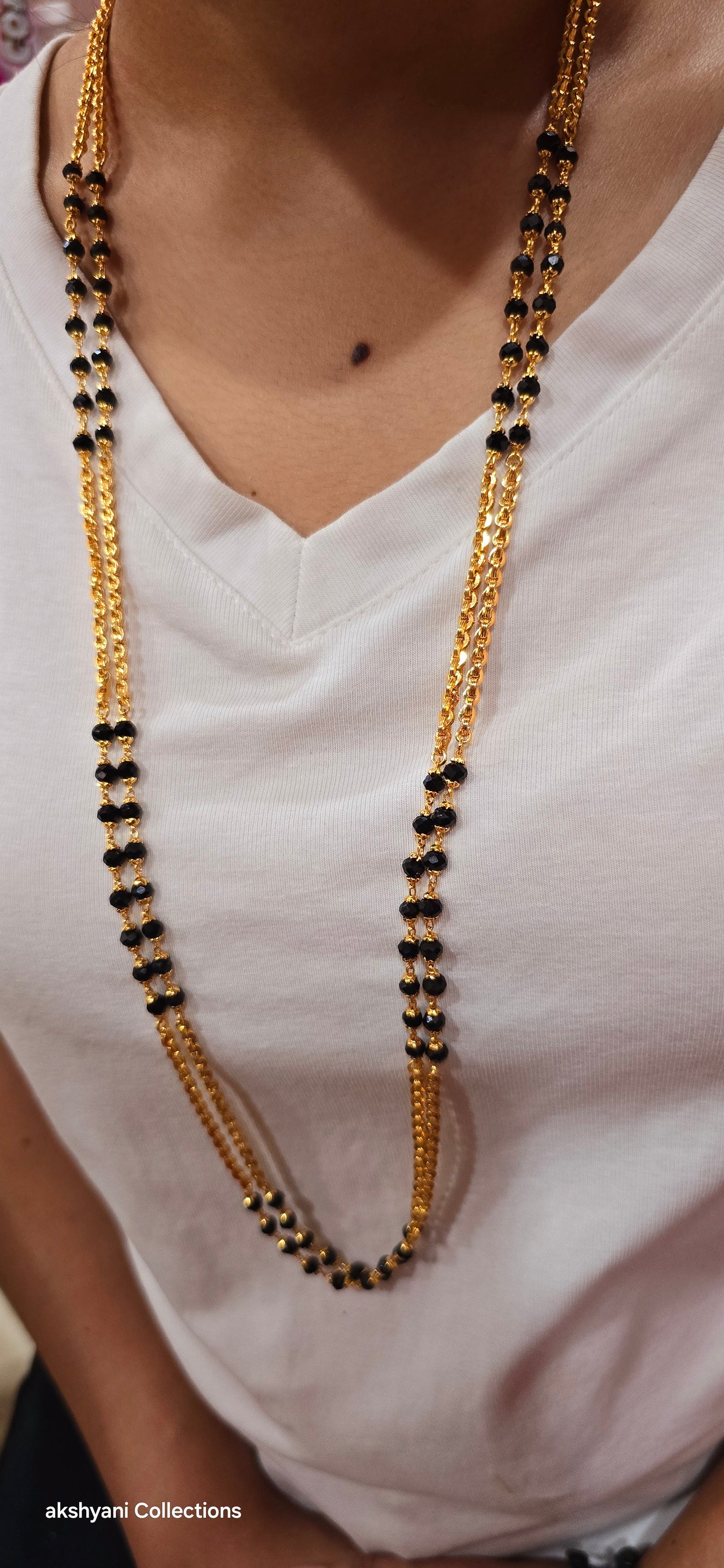 2 layer black beads. Function wear type of jewellery. Not suitable for shower.