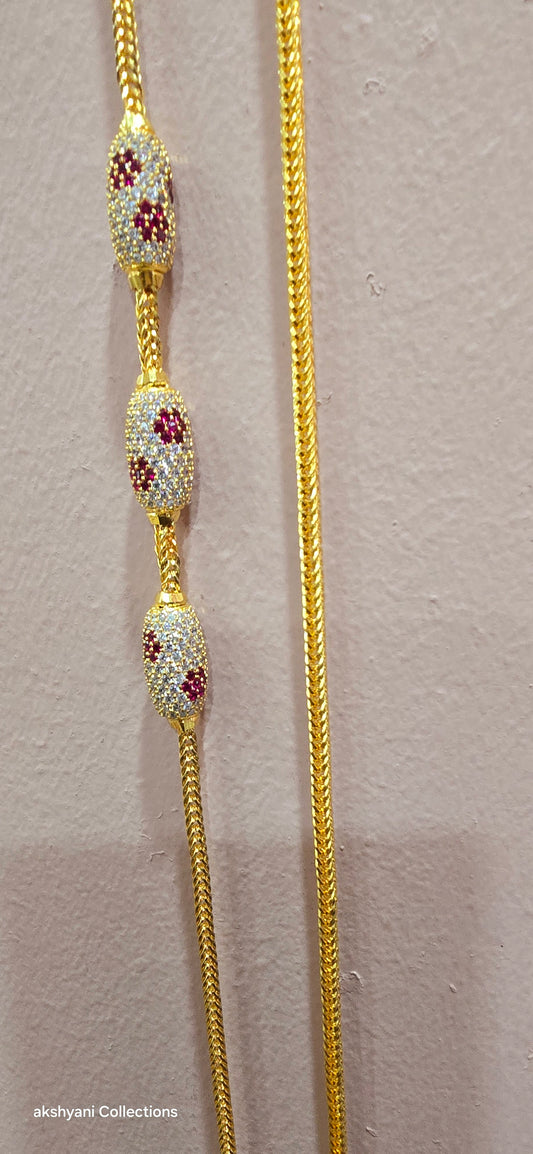 Ruby red with white pawprint mossanite stones Dailywear type thalikodi.  Not 916 gold