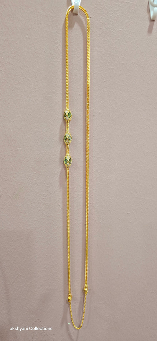 Function wear thalikodi with 3 inches extension. Green octagon shape brooch with mossanite stones embedded with brilliance