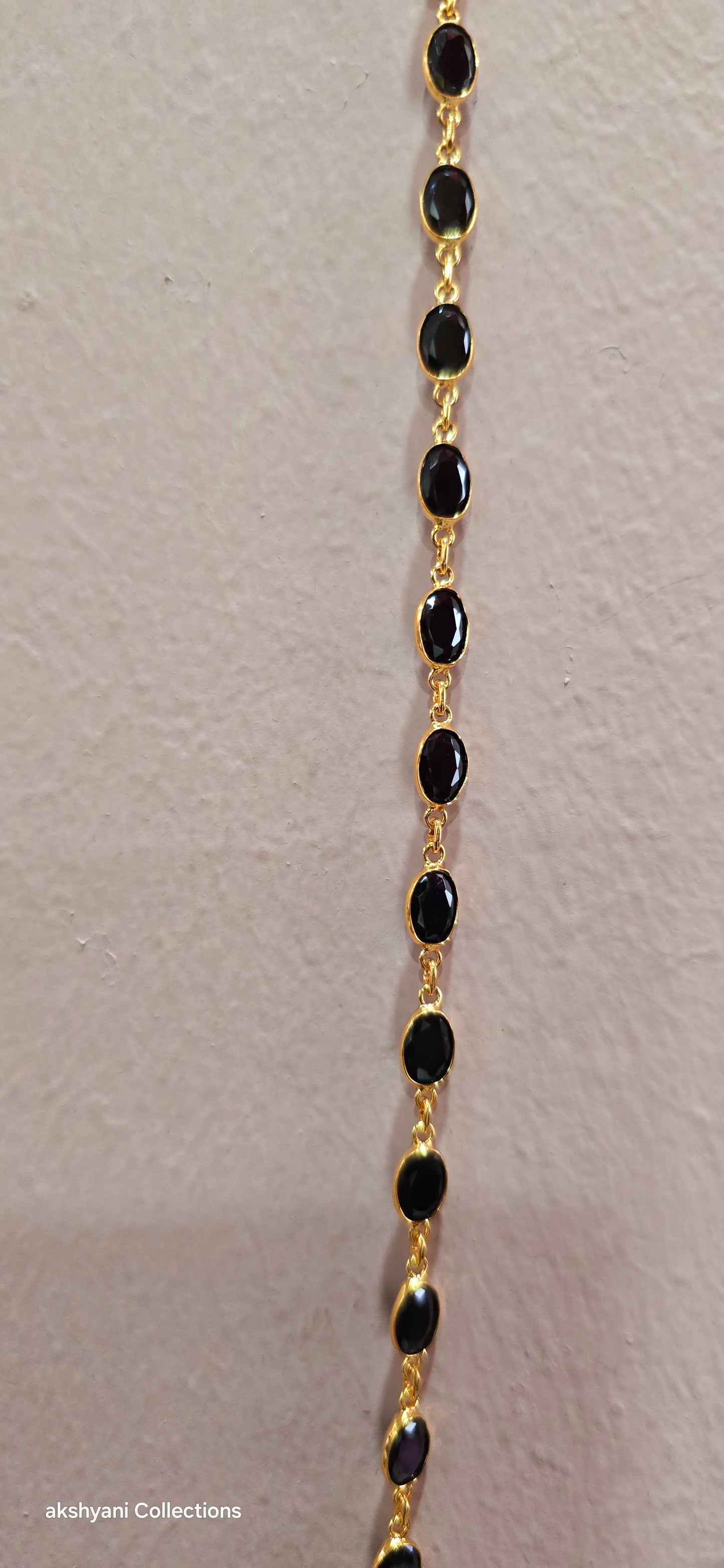 Black faucet beads. 30 inches. Not 916 gold. Functionwear