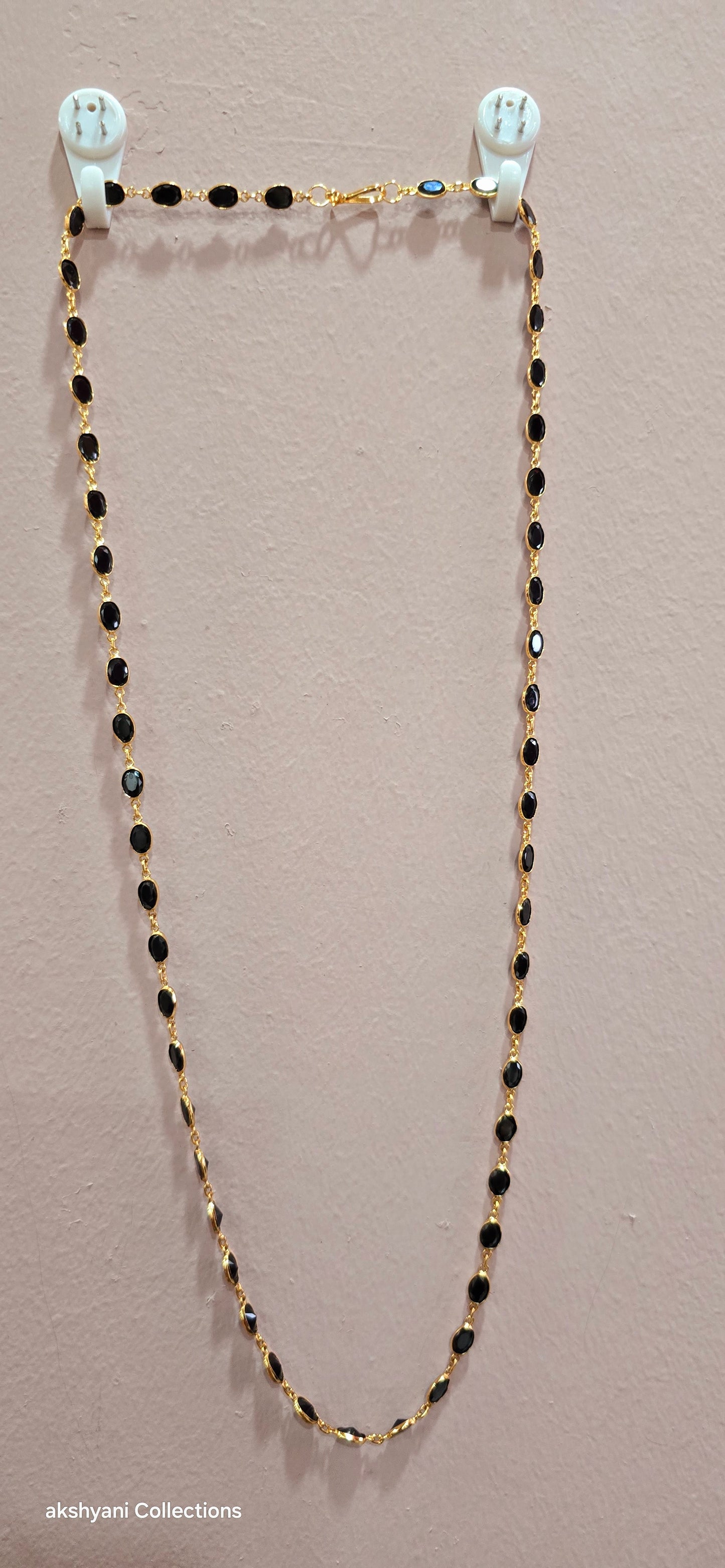 Black faucet beads. 30 inches. Not 916 gold. Functionwear