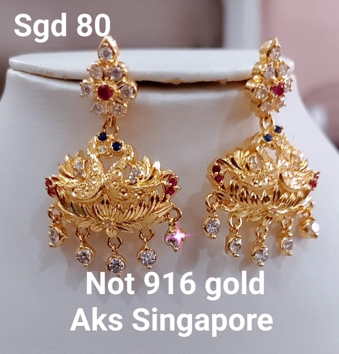 Exclusive peacock earrings