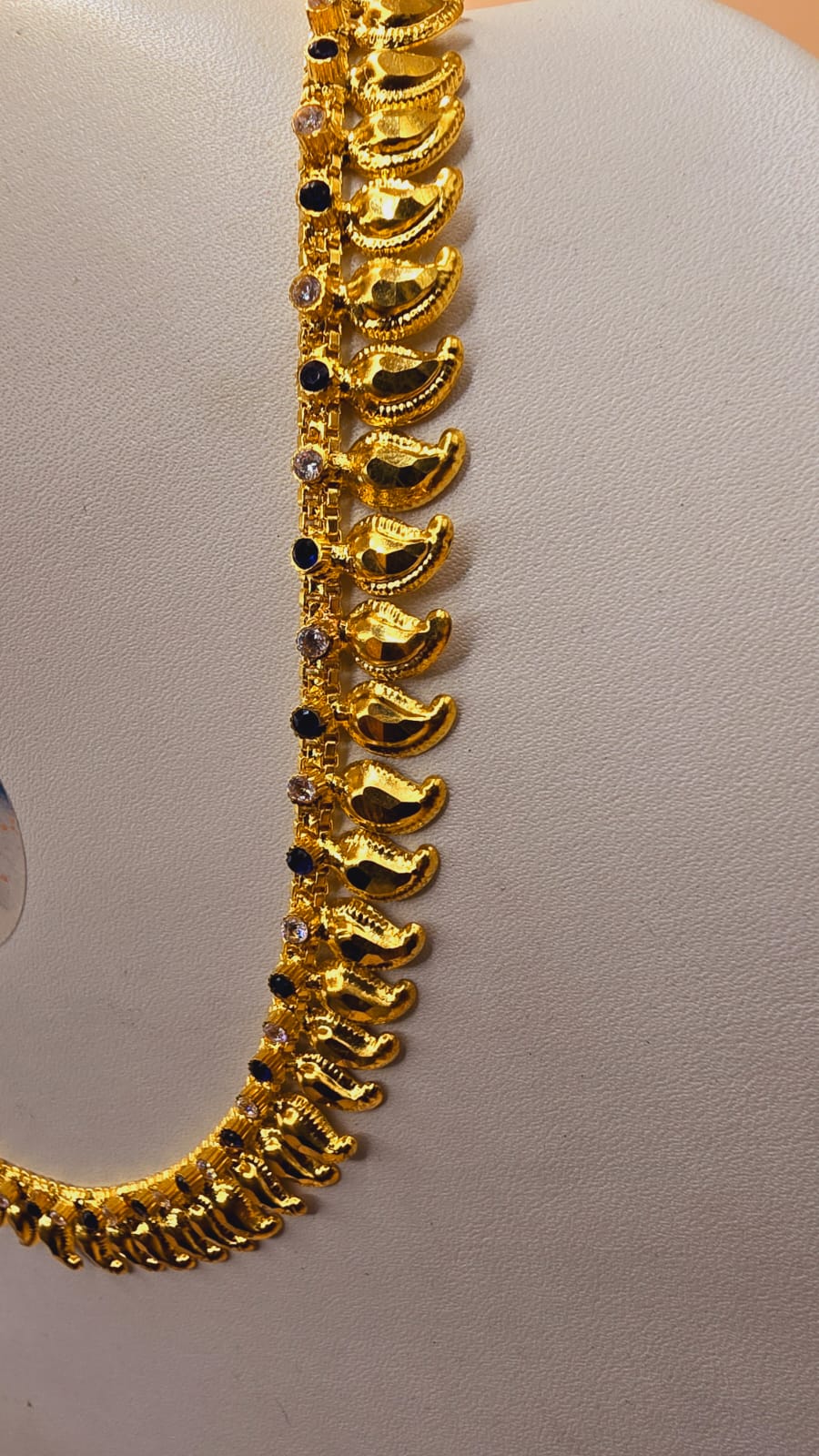 18 inches navy blue with white stones. Mango chain. Code 047T