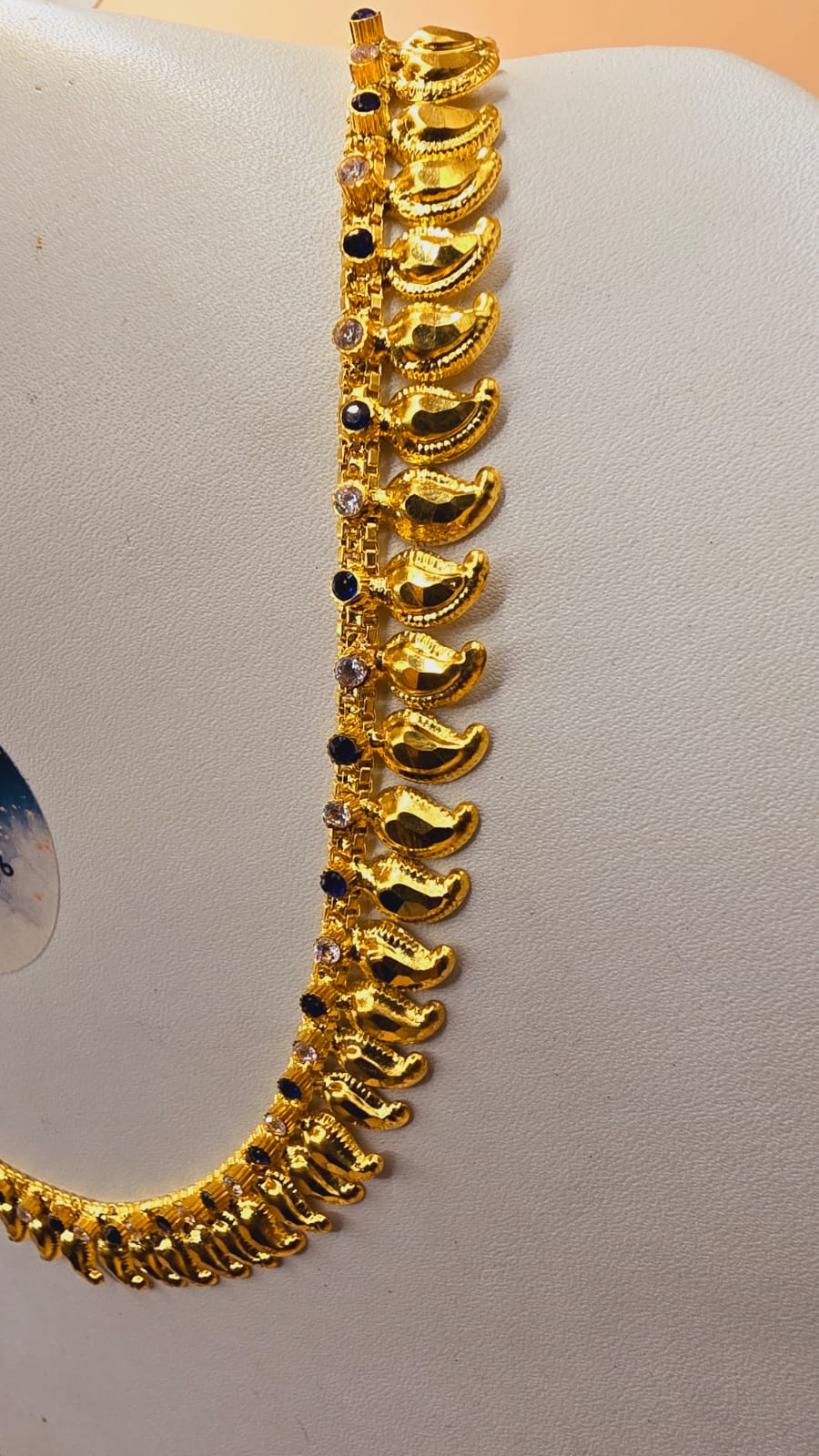 18 inches navy blue with white stones. Mango chain. Code 047T
