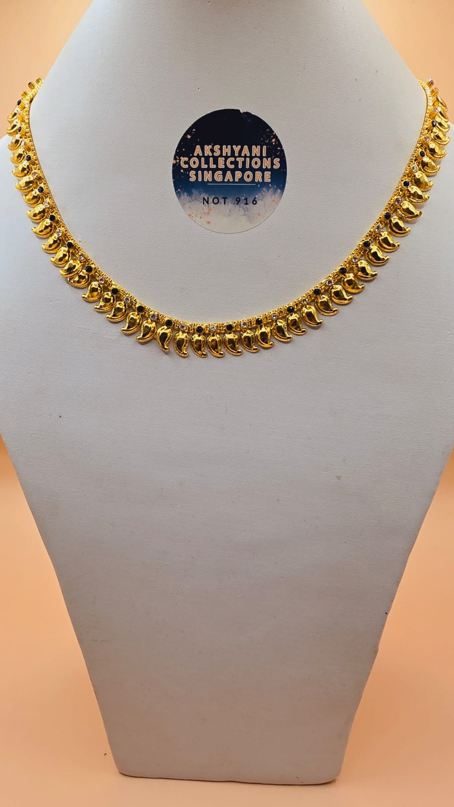 18 inches navy blue with white stones. Mango chain. Code 047T