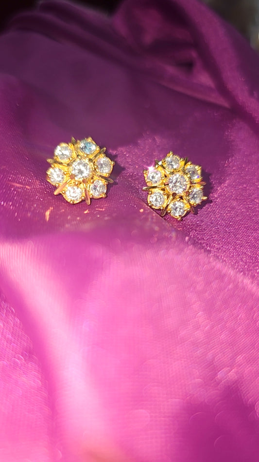 Mossanite stone earrings. INDIAN SCREW TYPE.  NOT 916 GOLD. 5 cents Singapore coin size