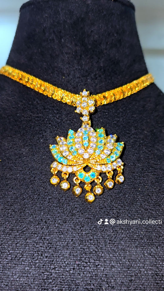 Aqua blue and white stones aatil with diamontele chain .Not 916 gold. Code 9097