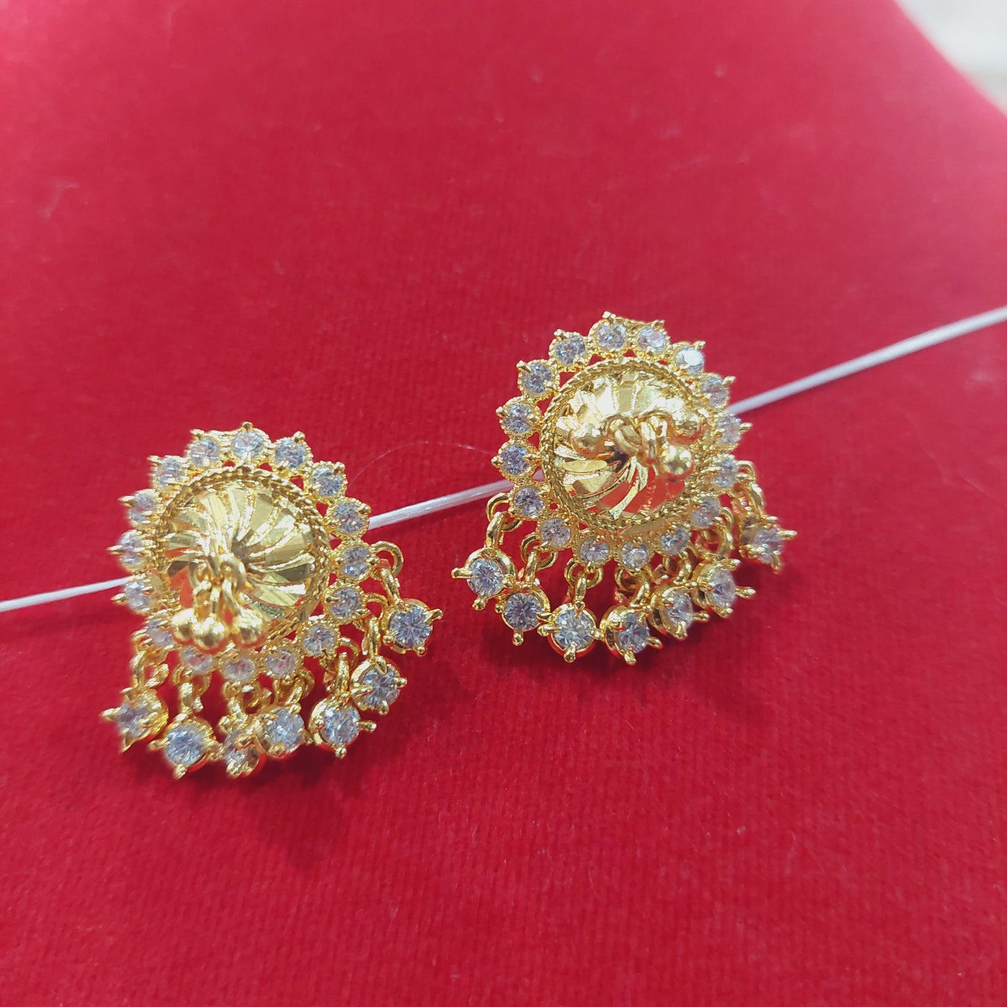 mossanite white stones thiruvilaiyadal earrings. Not 916. 20 cents coin circumference