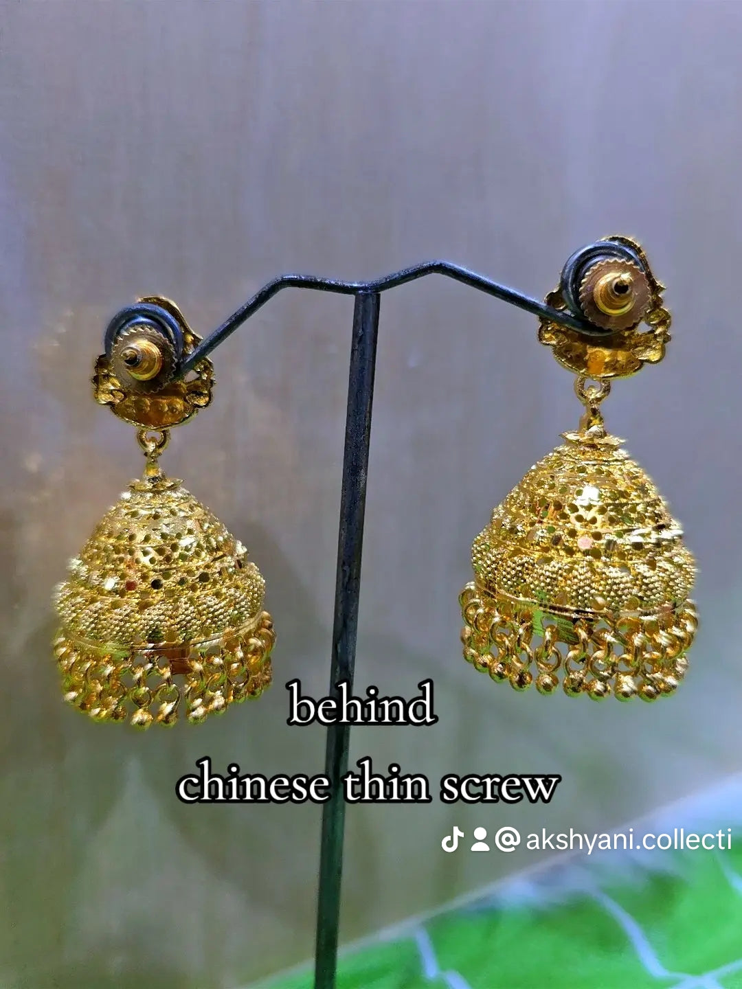 Chinese push type thin screw mahalakshimi jhumuki . Not 916 gold. Code 0987