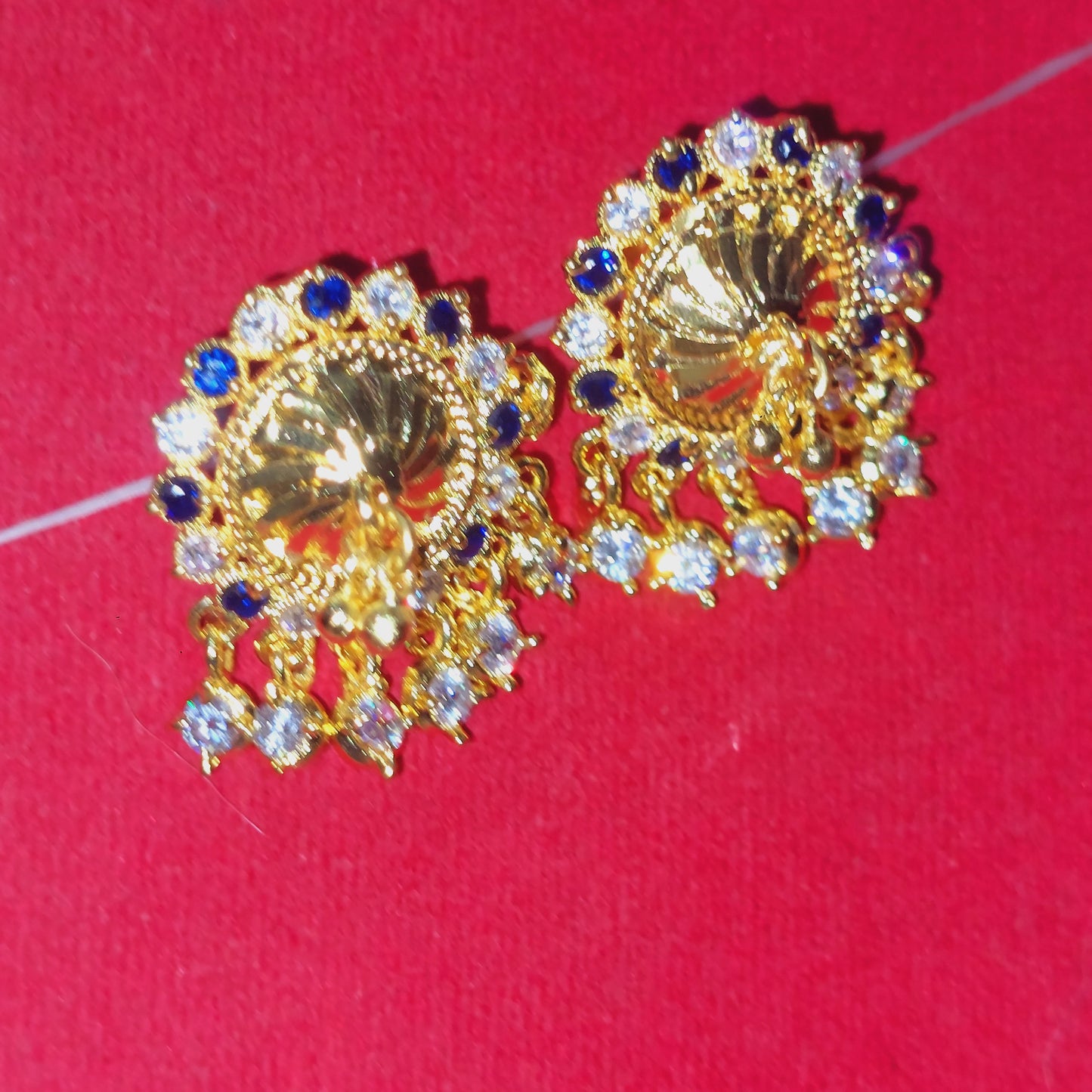 Navy blue and white mossanite stones earrings. Not 916 gold