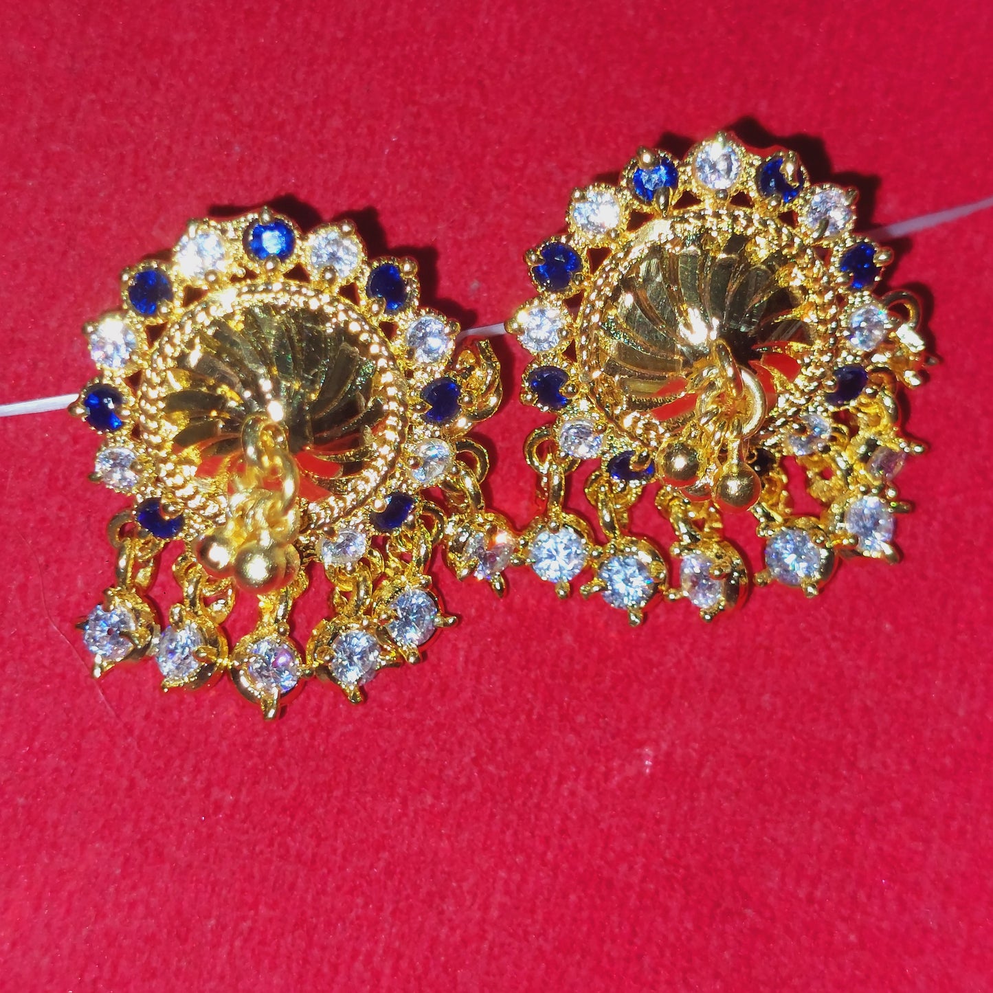 Navy blue and white mossanite stones earrings. Not 916 gold
