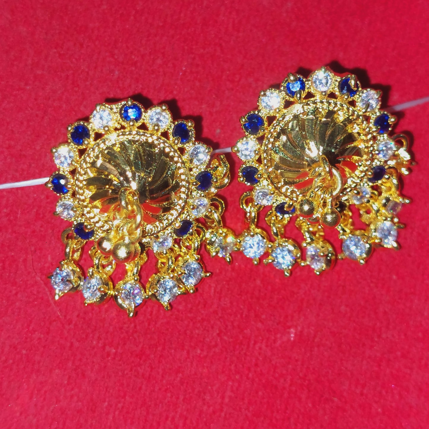 Navy blue and white mossanite stones earrings. Not 916 gold