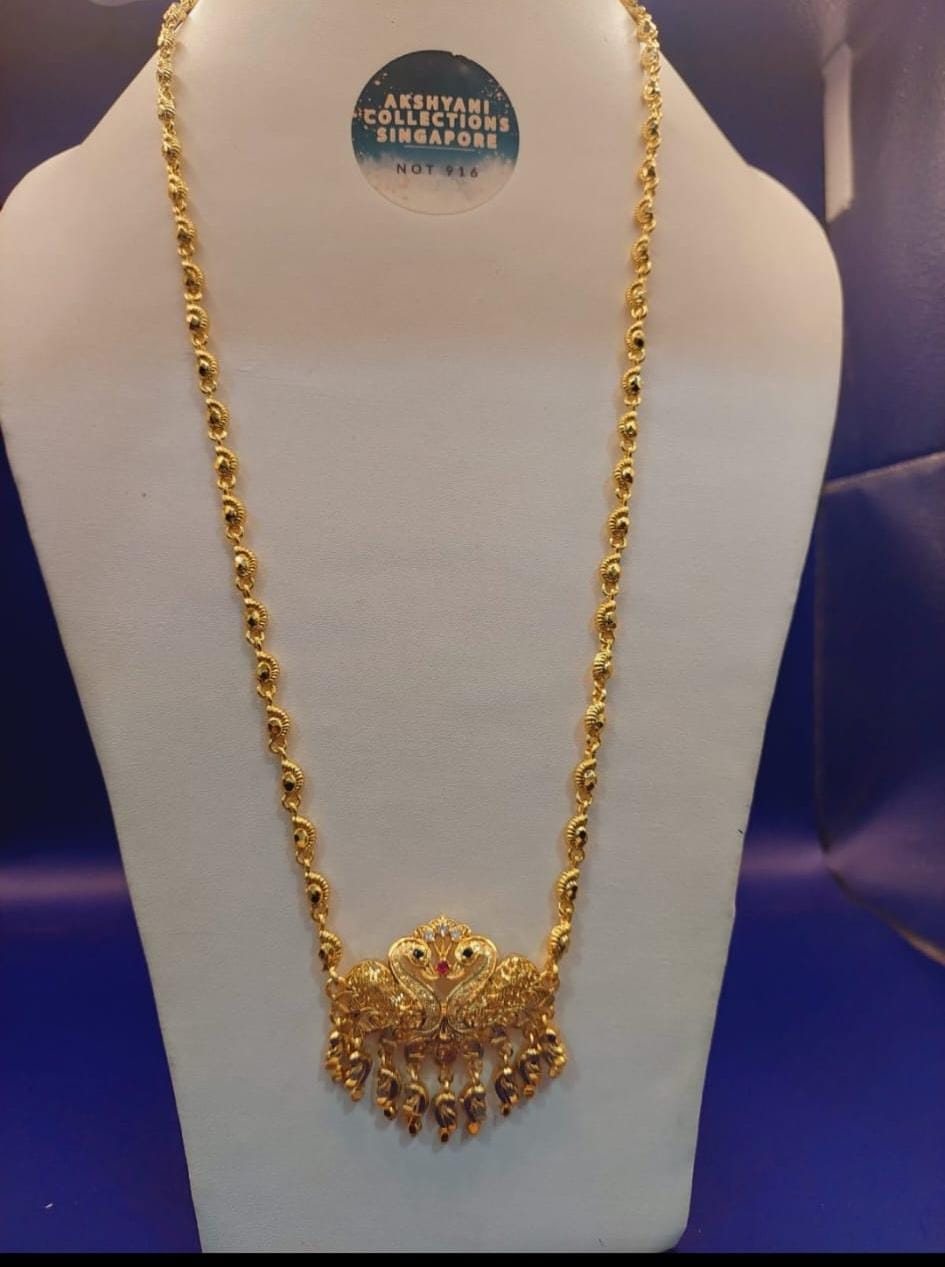 28 inches peacock paruppu chain. Functionwear type of jewellery. NOT 916 GOLD. Code 0585
