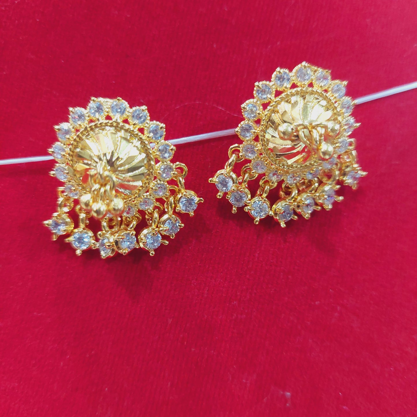 mossanite white stones thiruvilaiyadal earrings. Not 916. 20 cents coin circumference