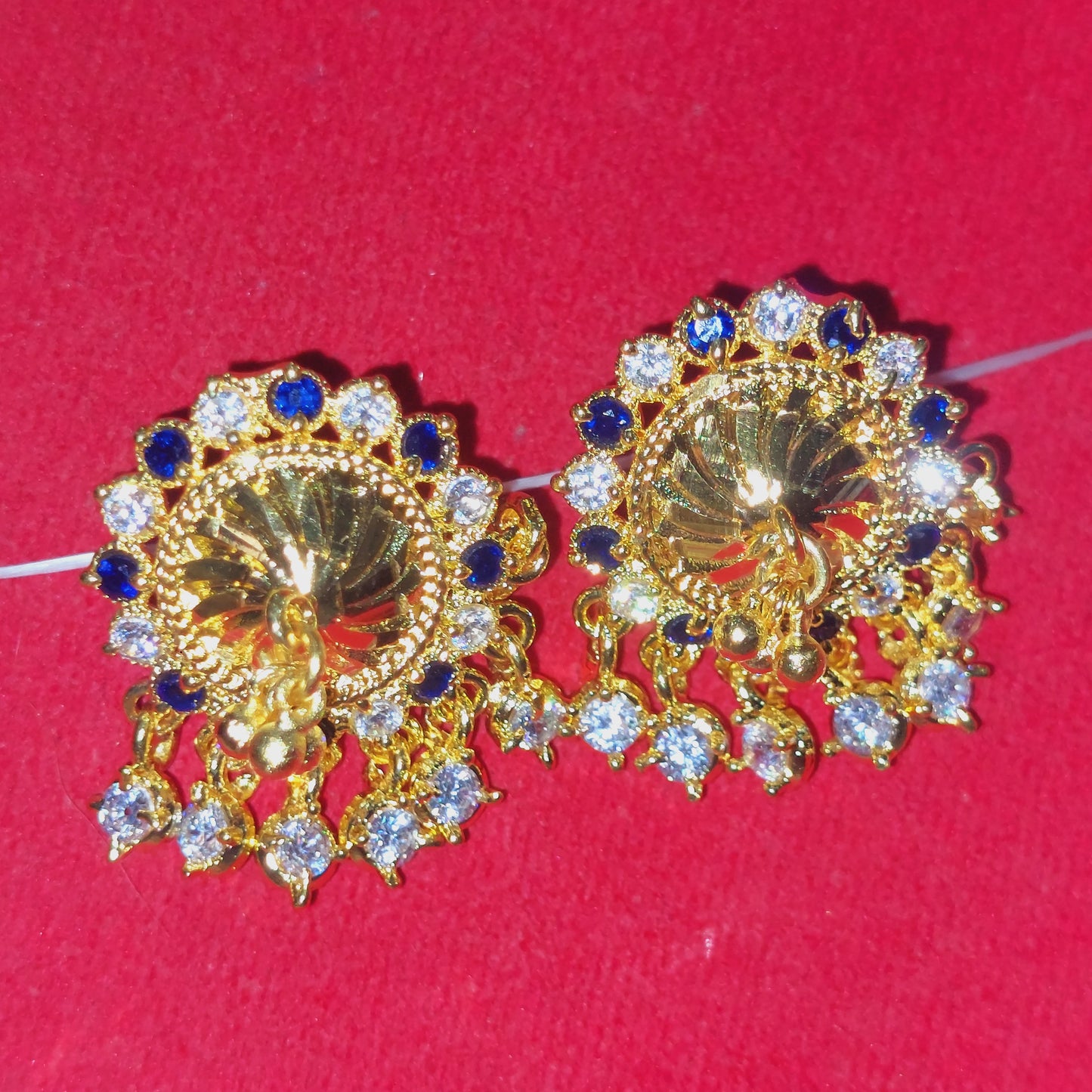 Navy blue and white mossanite stones earrings. Not 916 gold