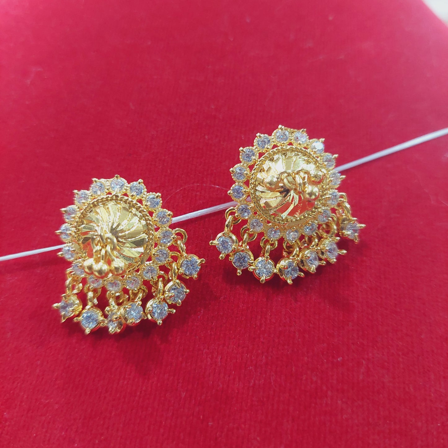 mossanite white stones thiruvilaiyadal earrings. Not 916. 20 cents coin circumference