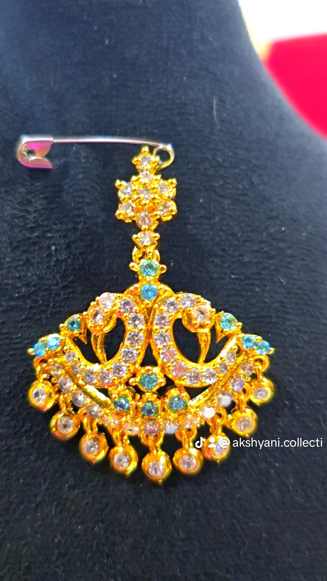 Peacock aqua blue aatil.Not 916 gold. Code 776