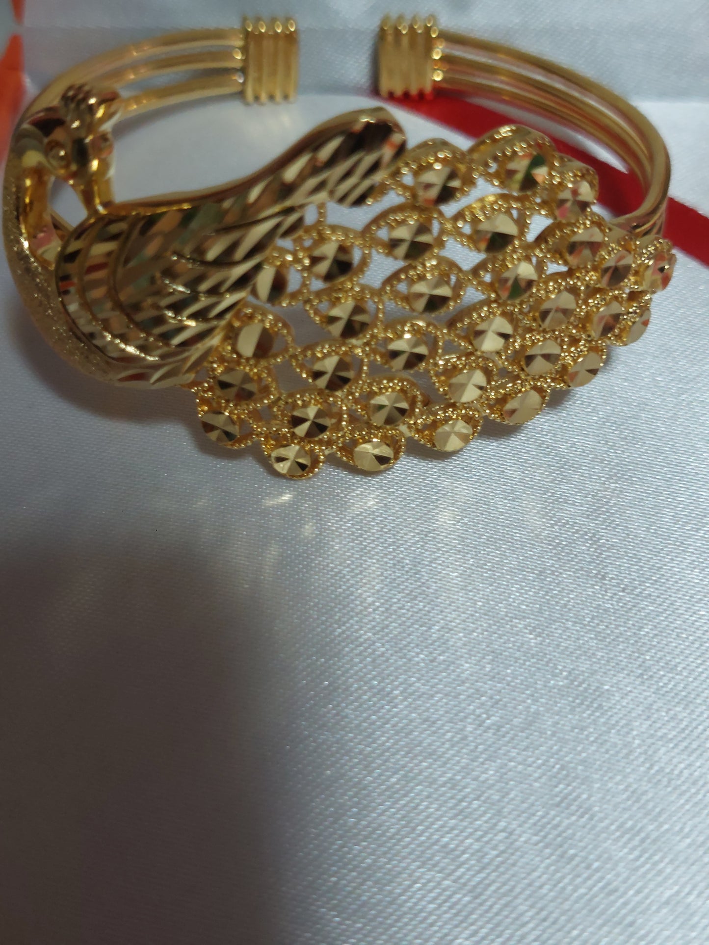 . Adjustable Peacock bangle  not 916 gold. A432