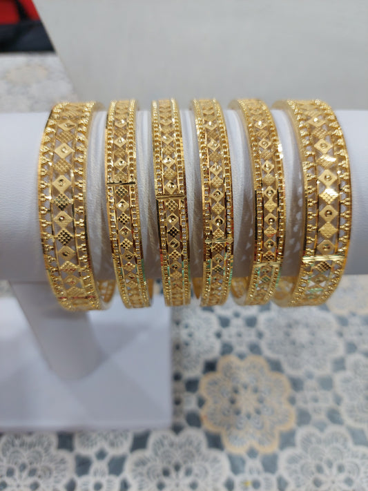 6 piece bangles not 916 gold. Code 2943