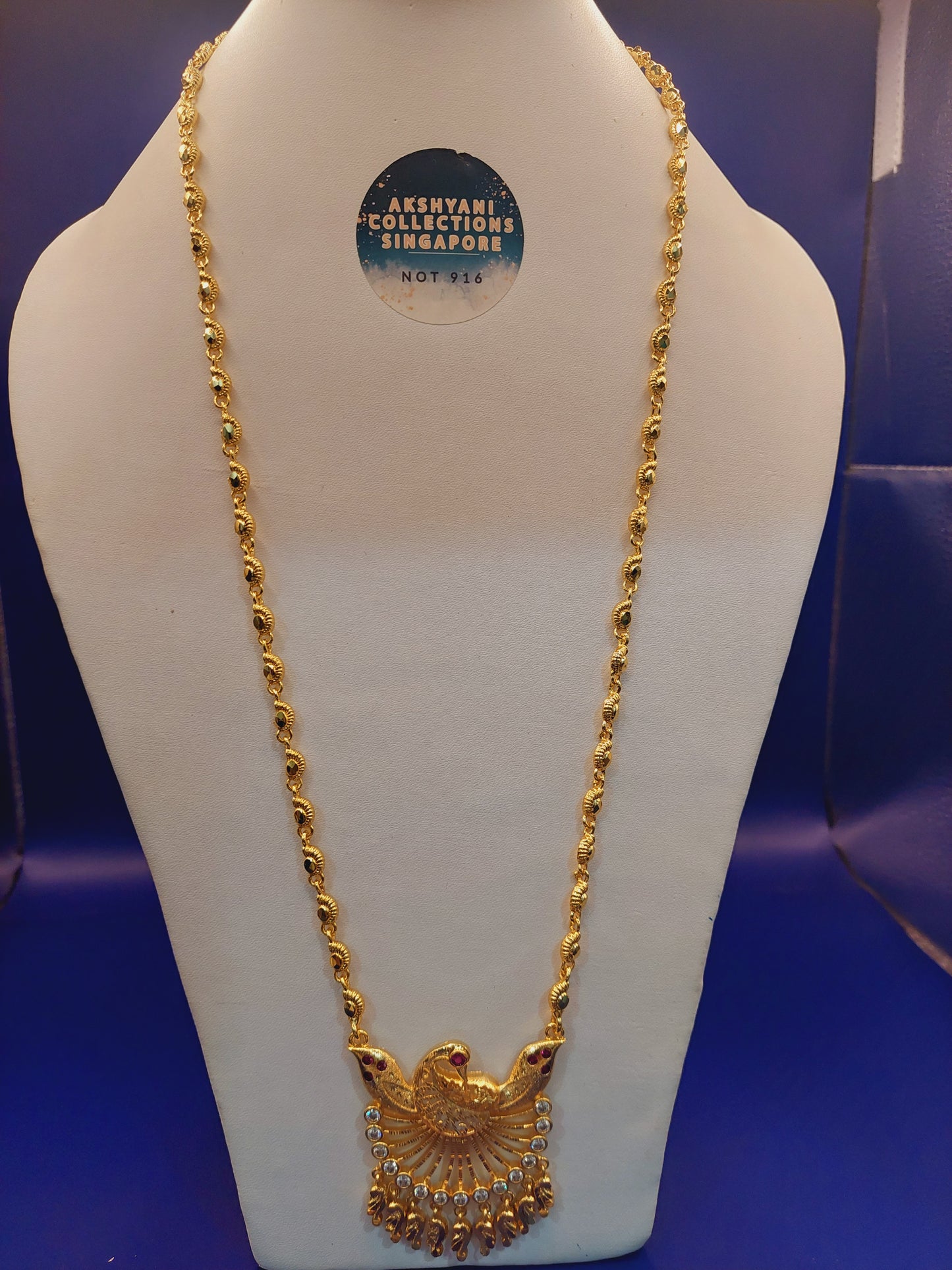 Code 786 peacock pendent with paruppu chain not 916 gold