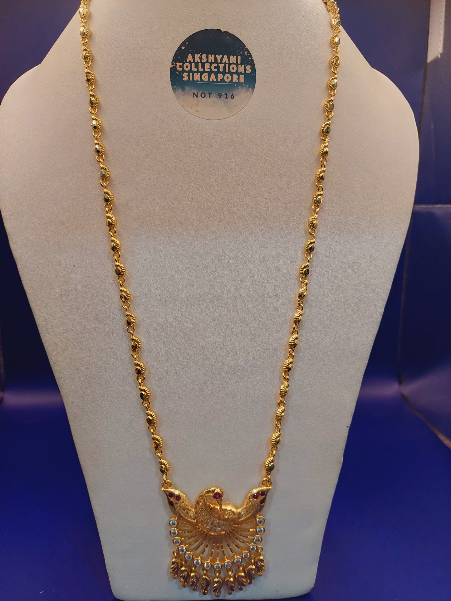 Code 786 peacock pendent with paruppu chain not 916 gold