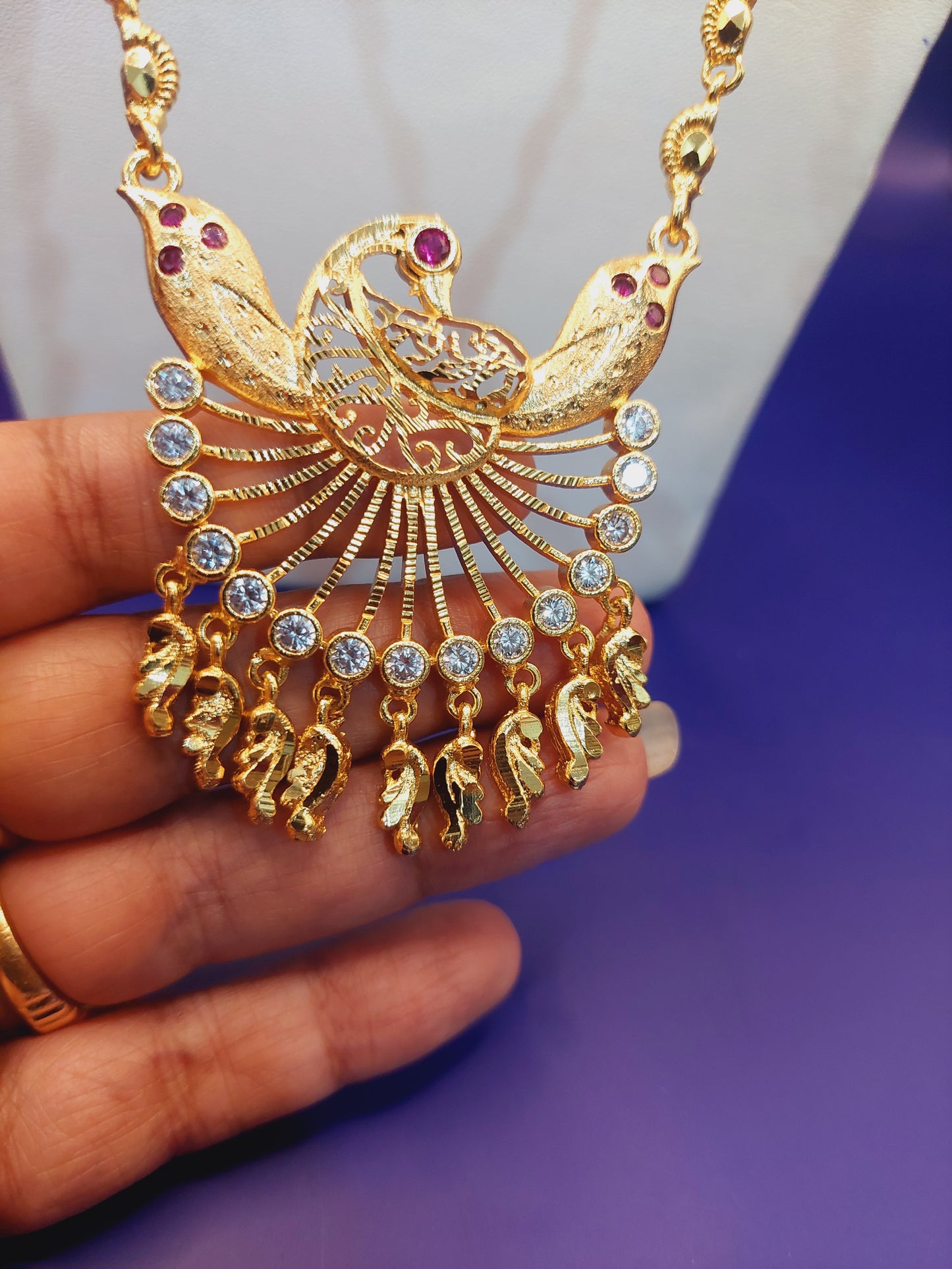 Code 786 peacock pendent with paruppu chain not 916 gold