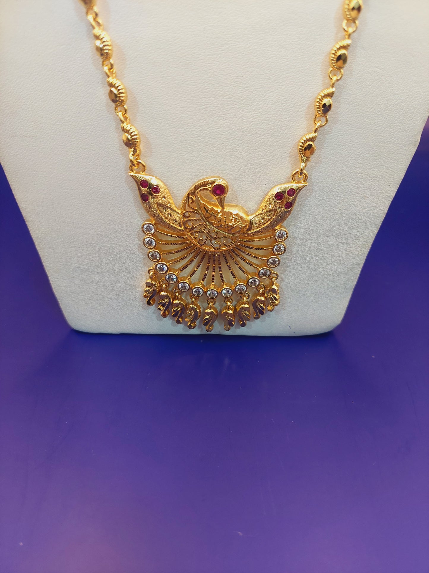 Code 786 peacock pendent with paruppu chain not 916 gold