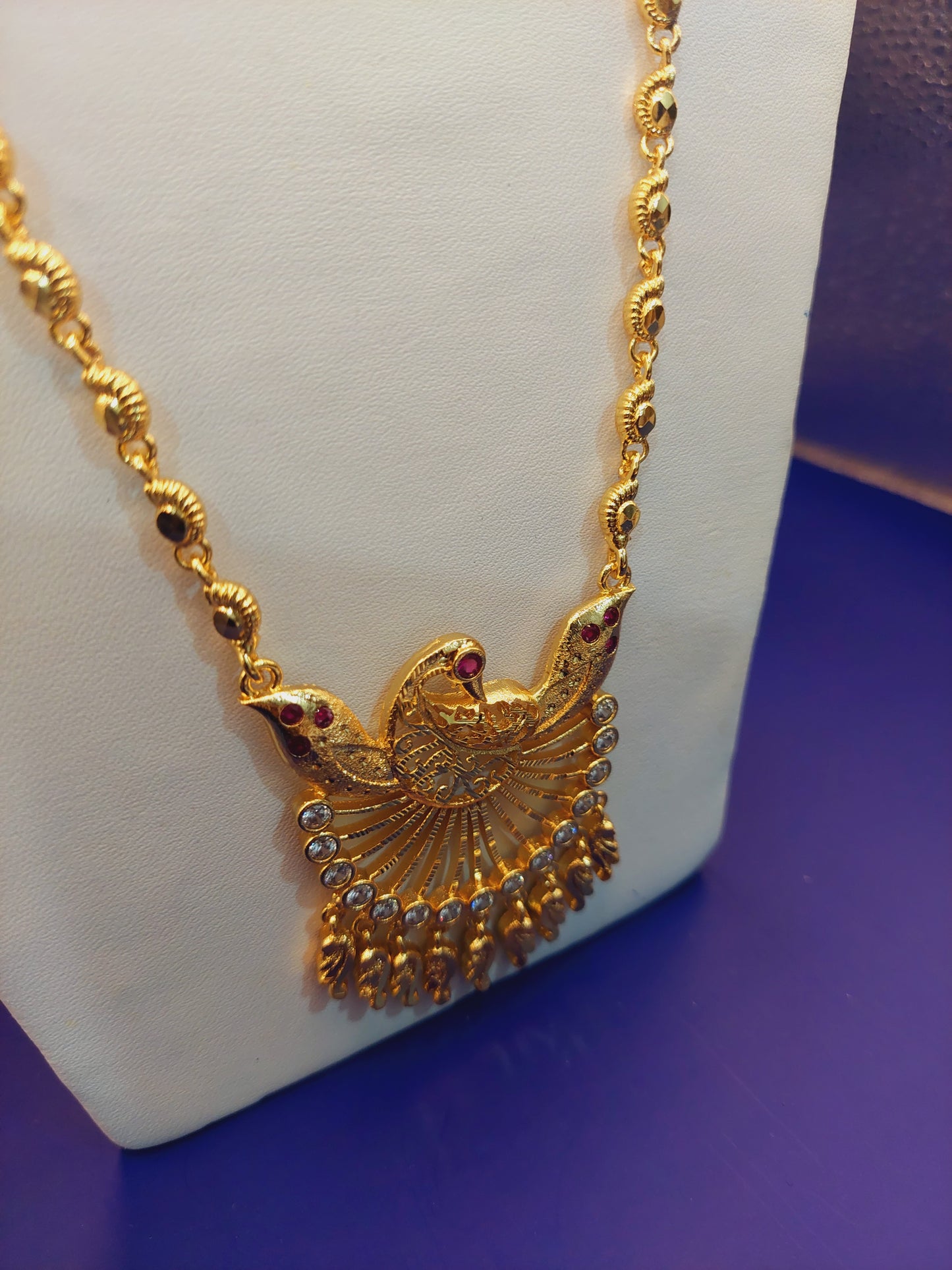 Code 786 peacock pendent with paruppu chain not 916 gold