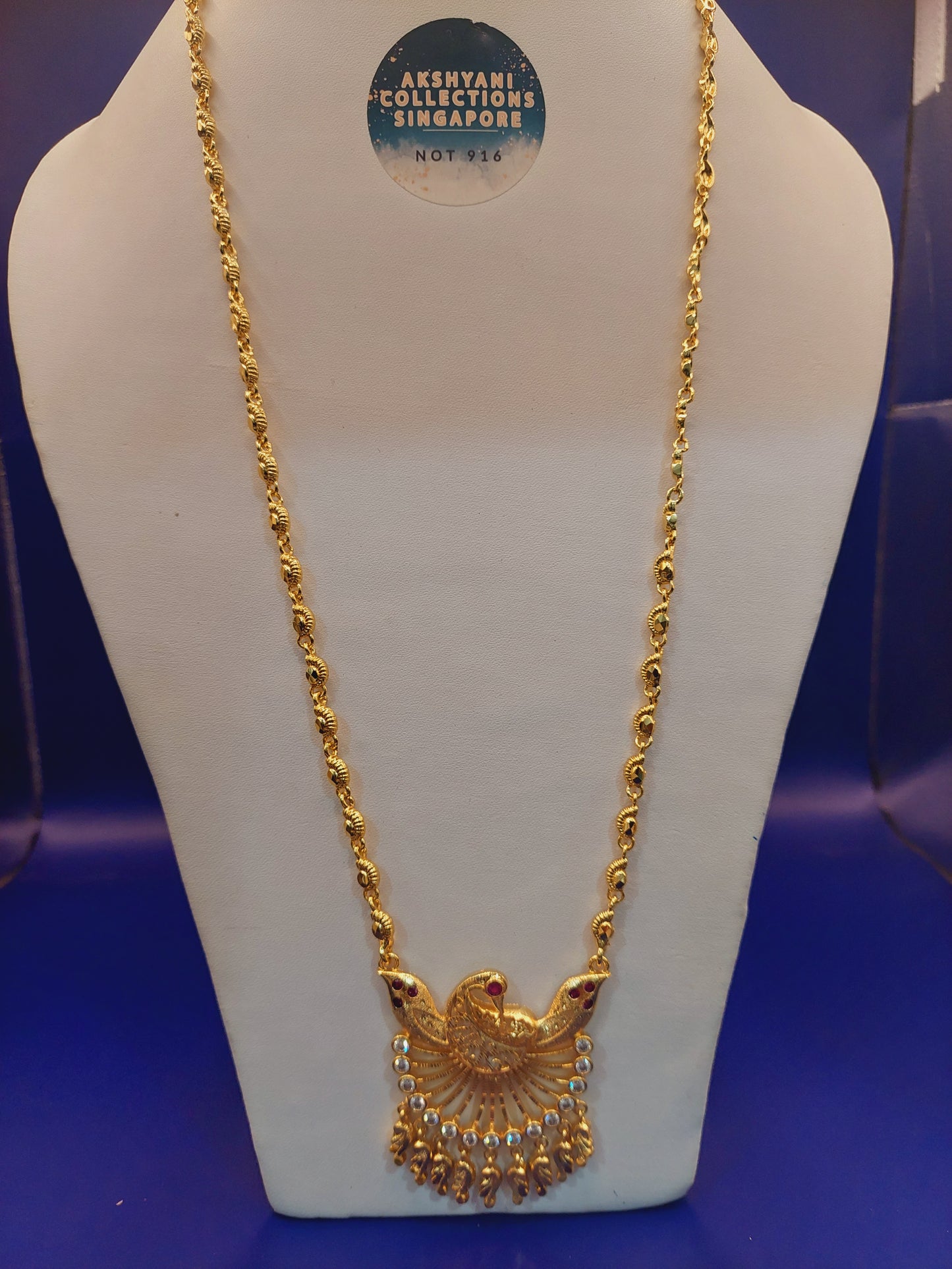 Code 786 peacock pendent with paruppu chain not 916 gold