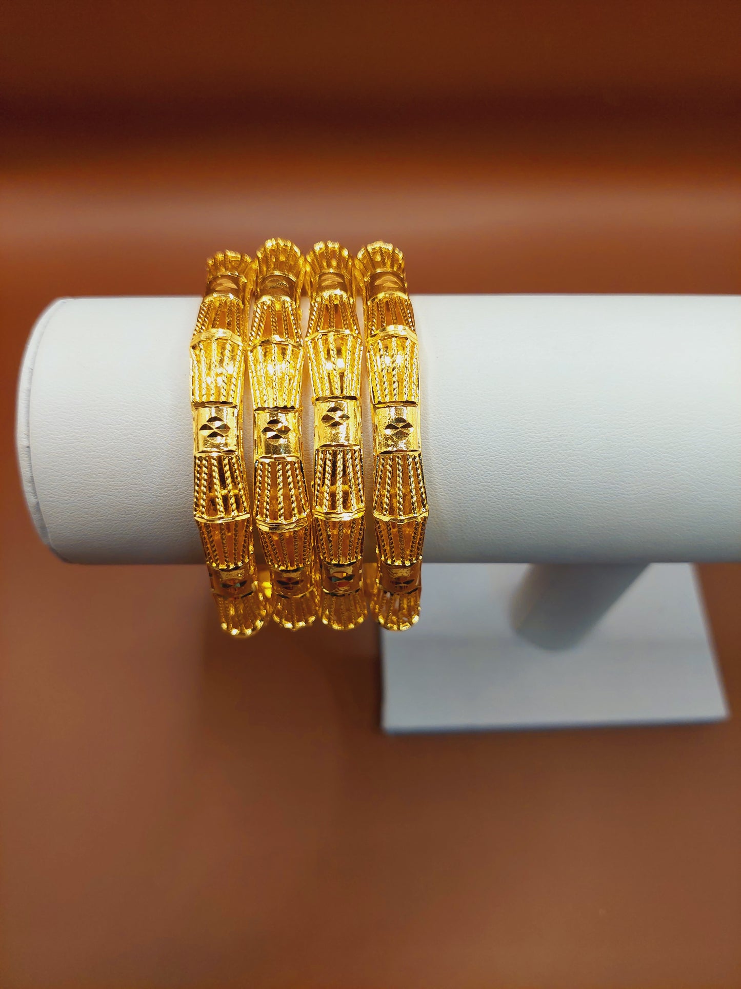 Not 916 gold. 4 pc bangle code 780 ( 2.10)