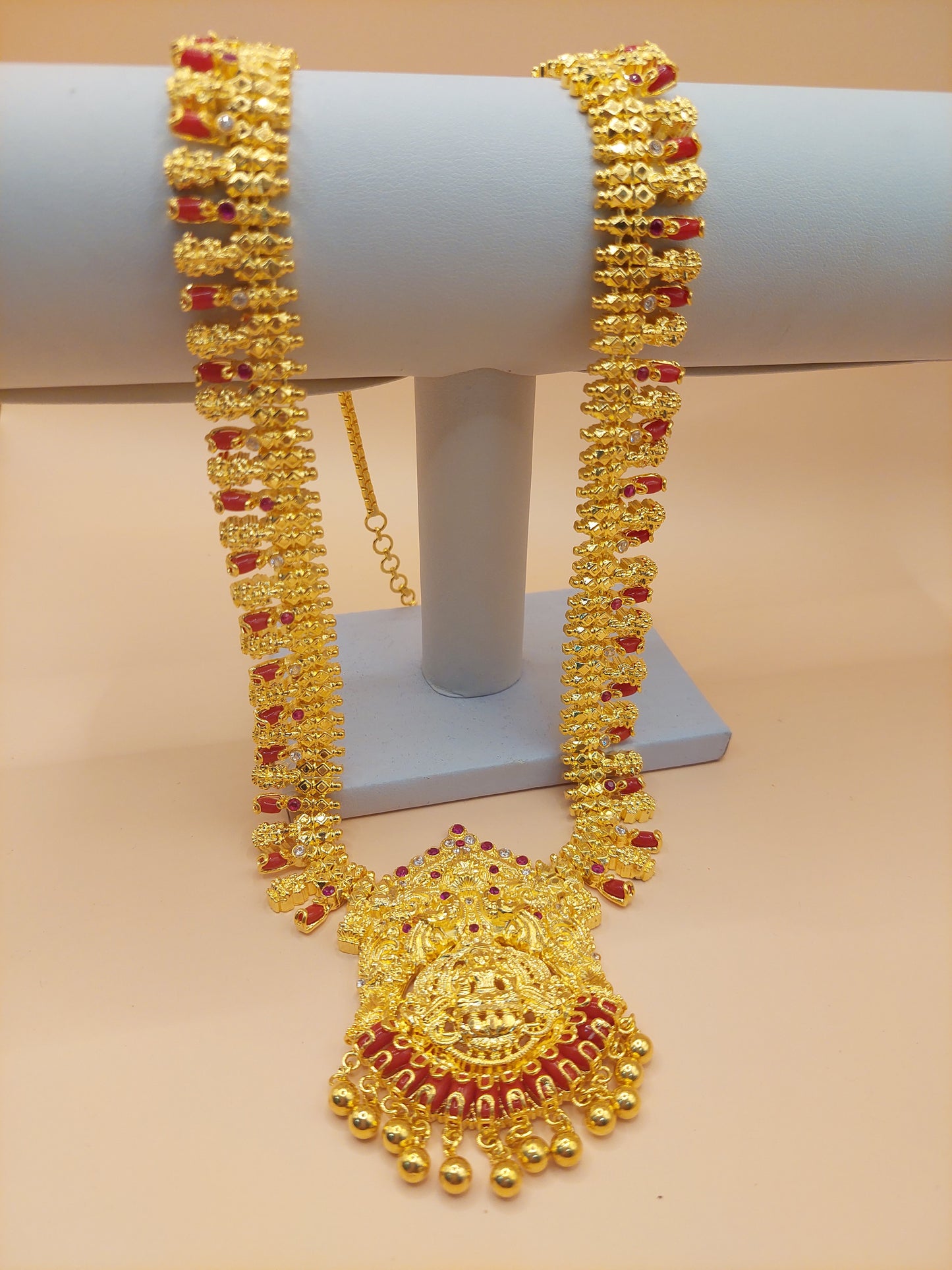 Code 609A 28 inches pavaalam ( coral ) and mahalakshimi with white abd red mossanite stones