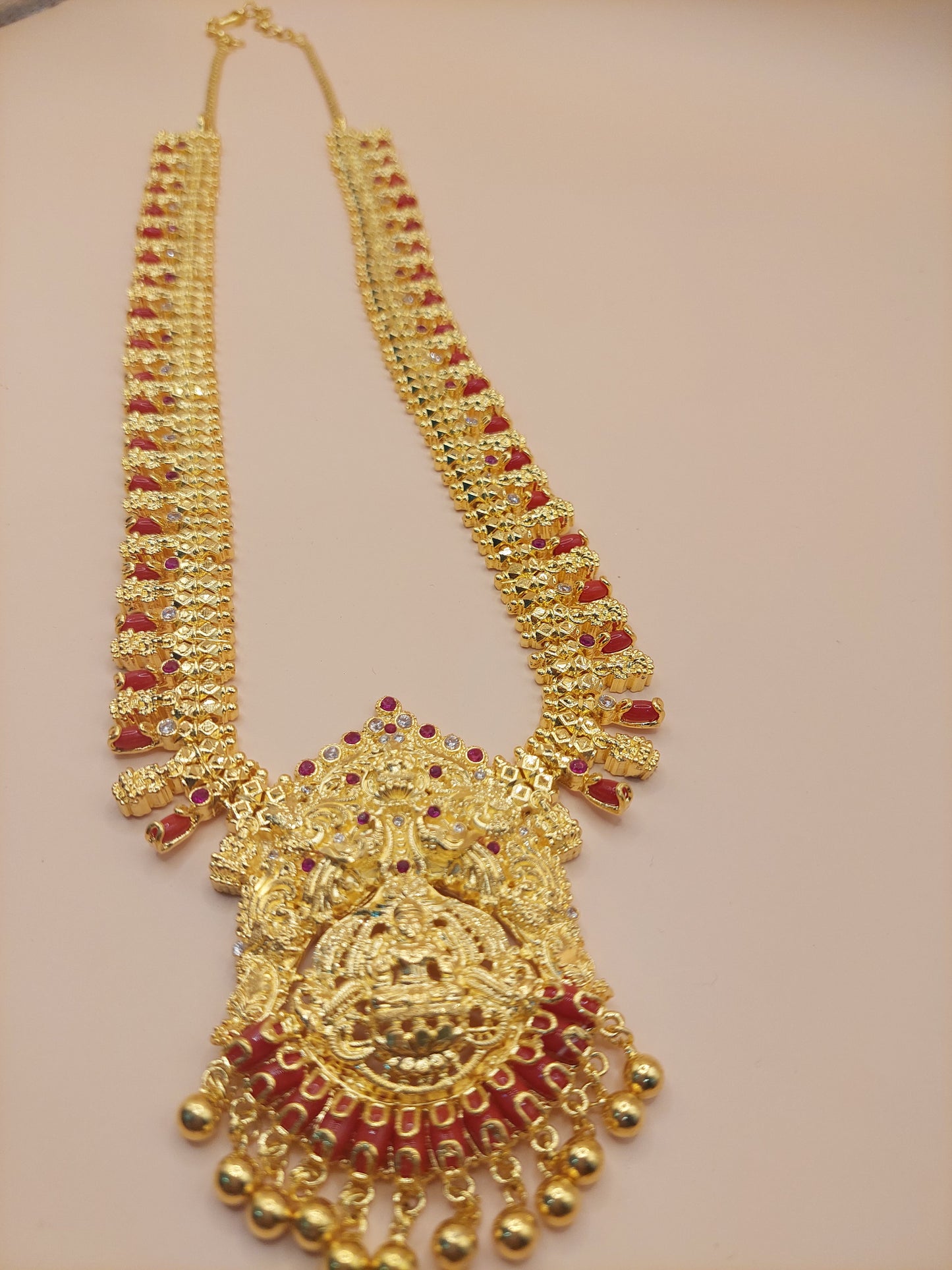 Code 609A 28 inches pavaalam ( coral ) and mahalakshimi with white abd red mossanite stones