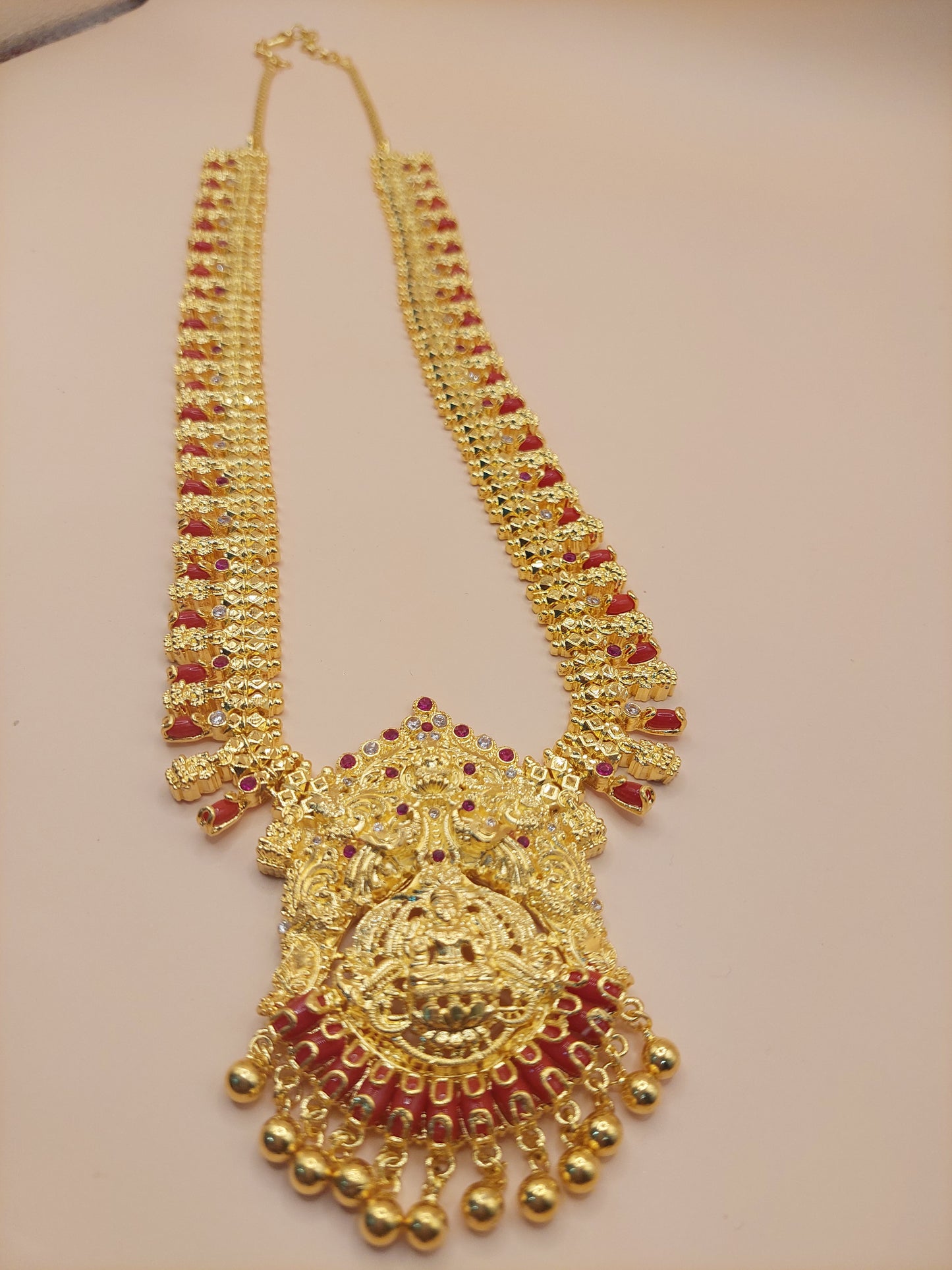 Code 609A 28 inches pavaalam ( coral ) and mahalakshimi with white abd red mossanite stones