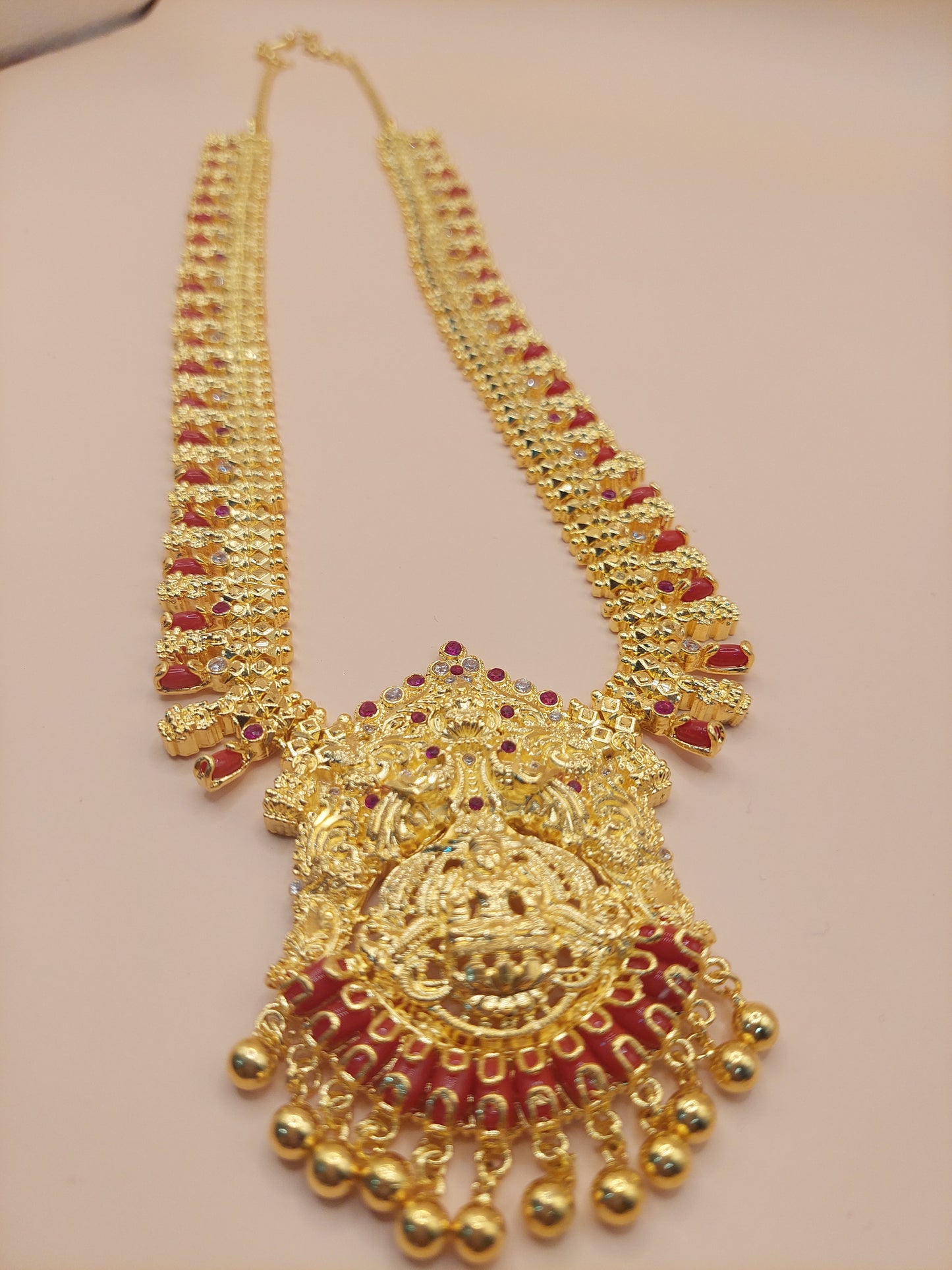 Code 609A 28 inches pavaalam ( coral ) and mahalakshimi with white abd red mossanite stones