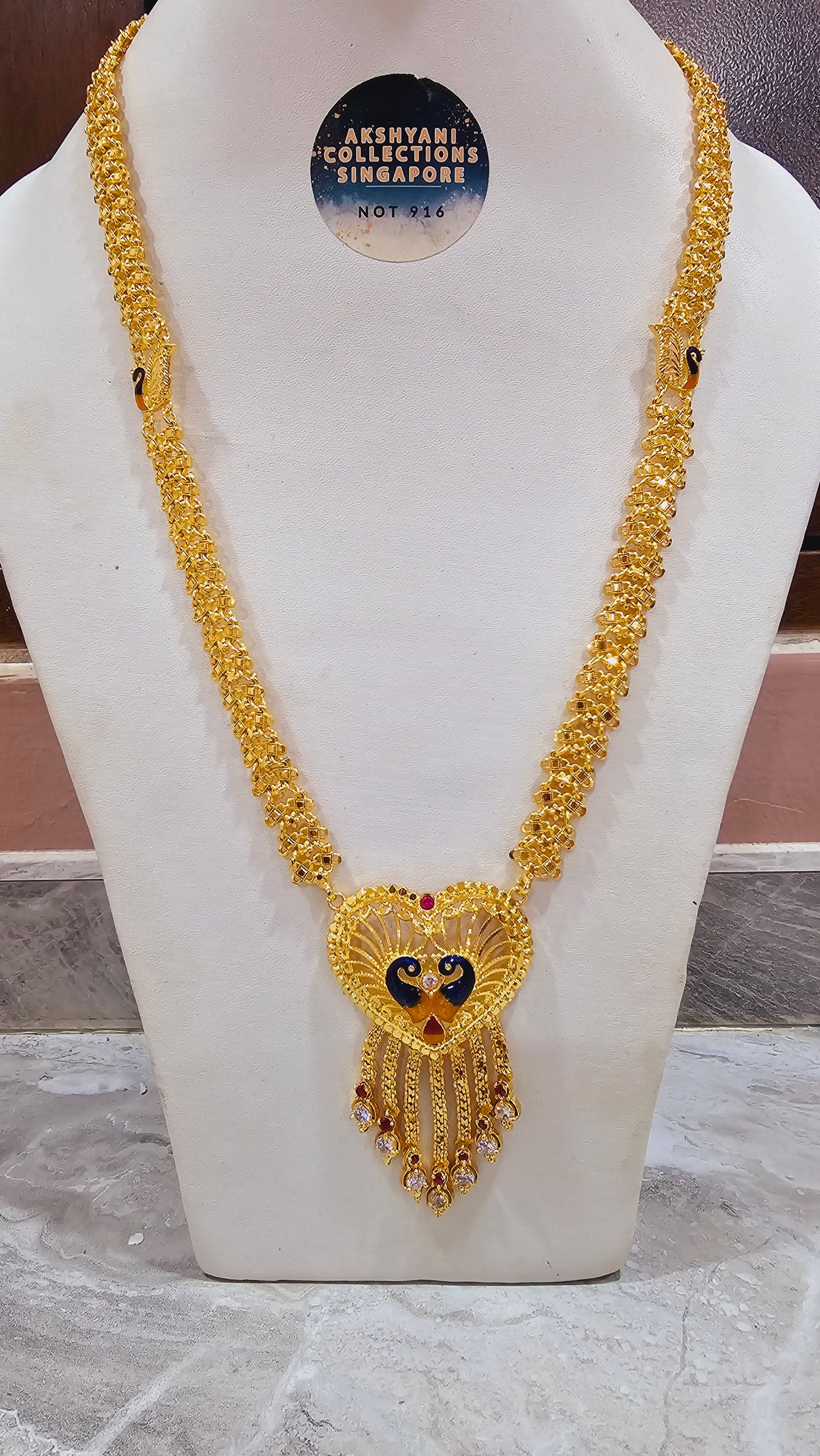 Peacock maalai code 804Y. 28 inches in length.  Not 916 gold