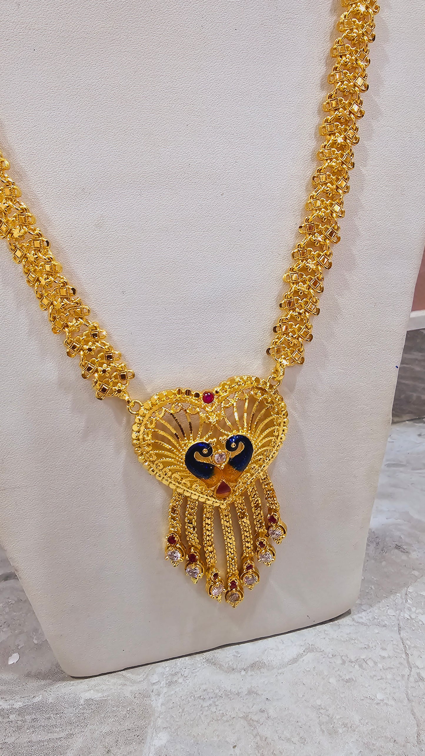 Peacock maalai code 804Y. 28 inches in length.  Not 916 gold