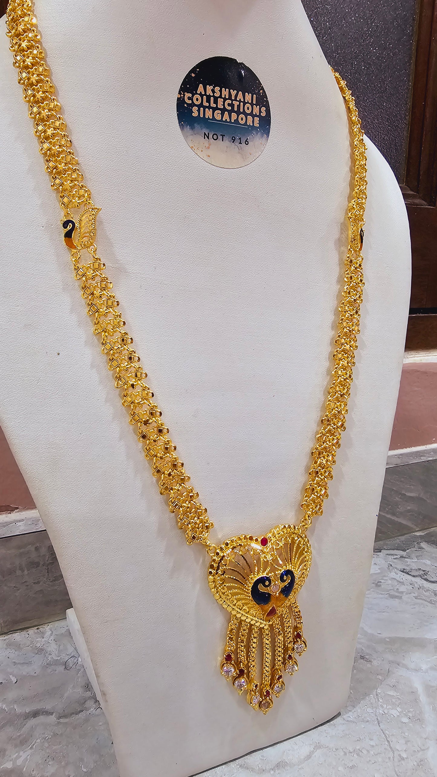 Peacock maalai code 804Y. 28 inches in length.  Not 916 gold