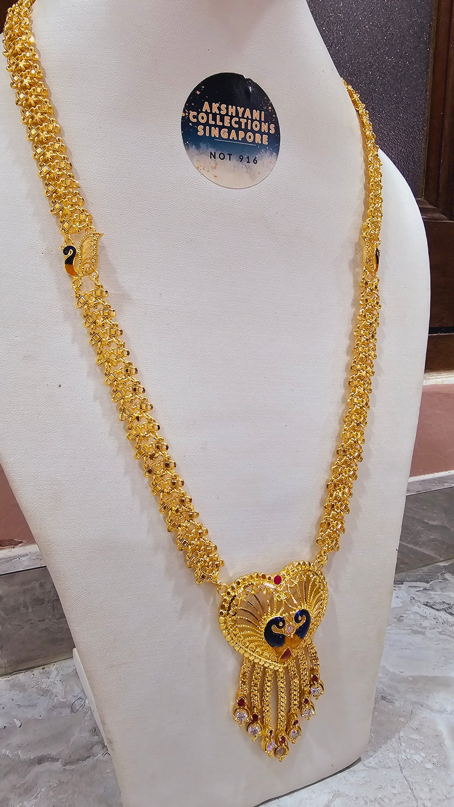 Peacock maalai code 804Y. 28 inches in length.  Not 916 gold