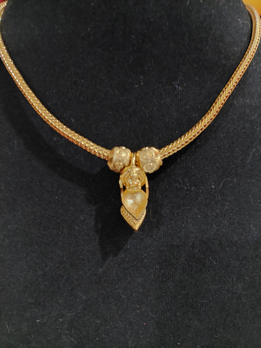 Not 916 gold. Mahalakshimi vilaku pendent with chain. Function wear type of jewellery