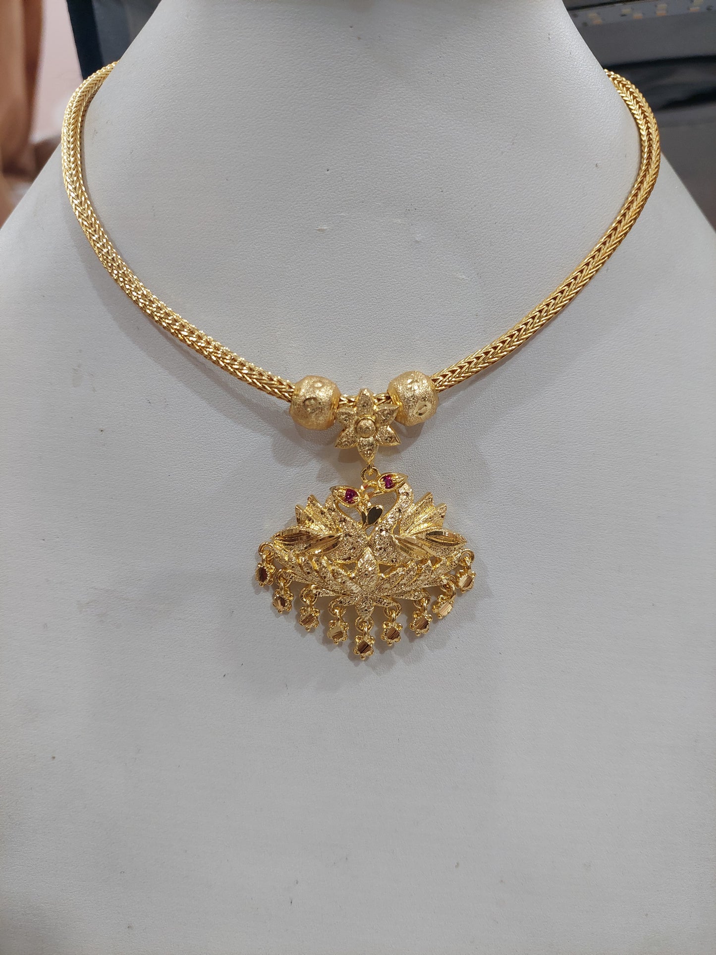 Peacock full gold aatil with chain. Not 916 gold. Function wear type of jewellery. Removable pendent.