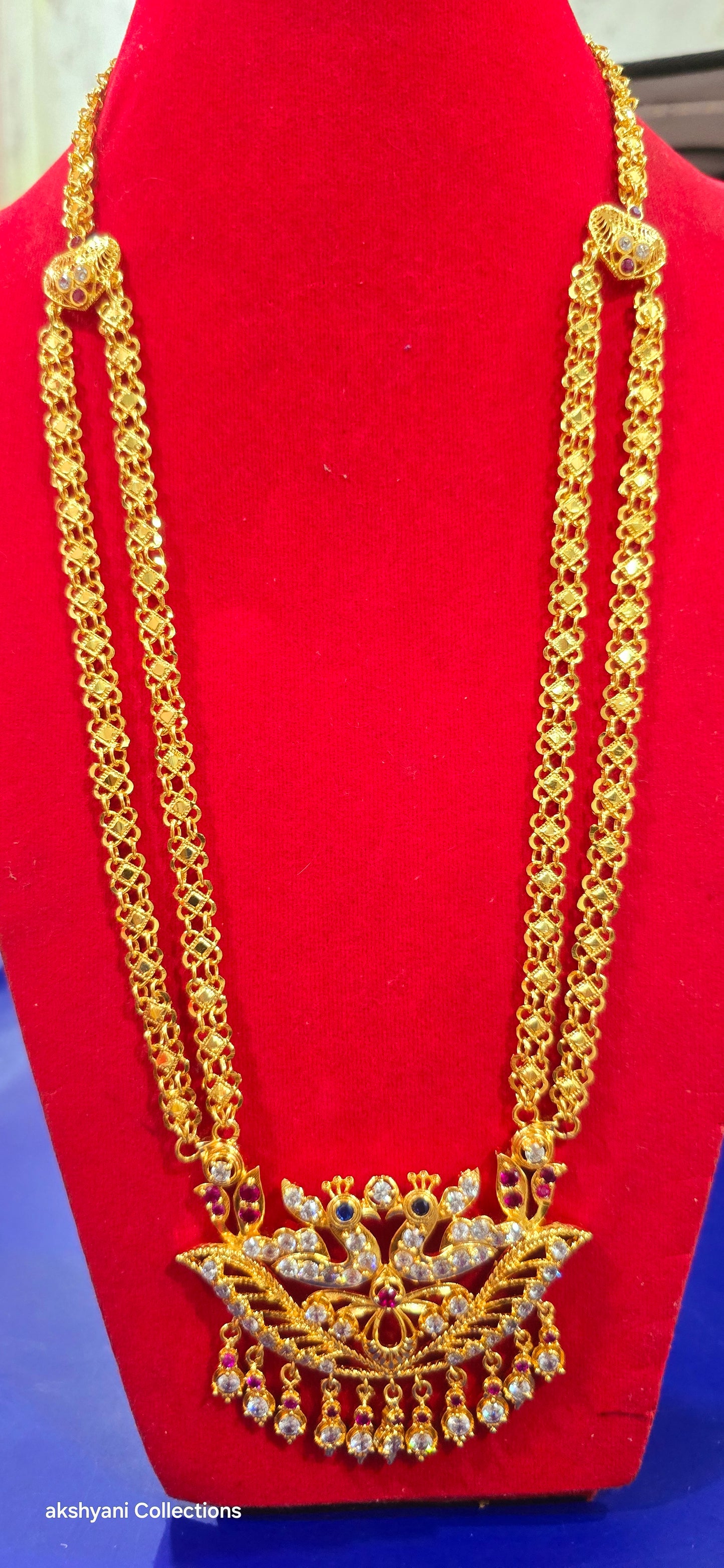 2 layer chain with peacock pendent. Function wear type of jewellery.  28 inches length