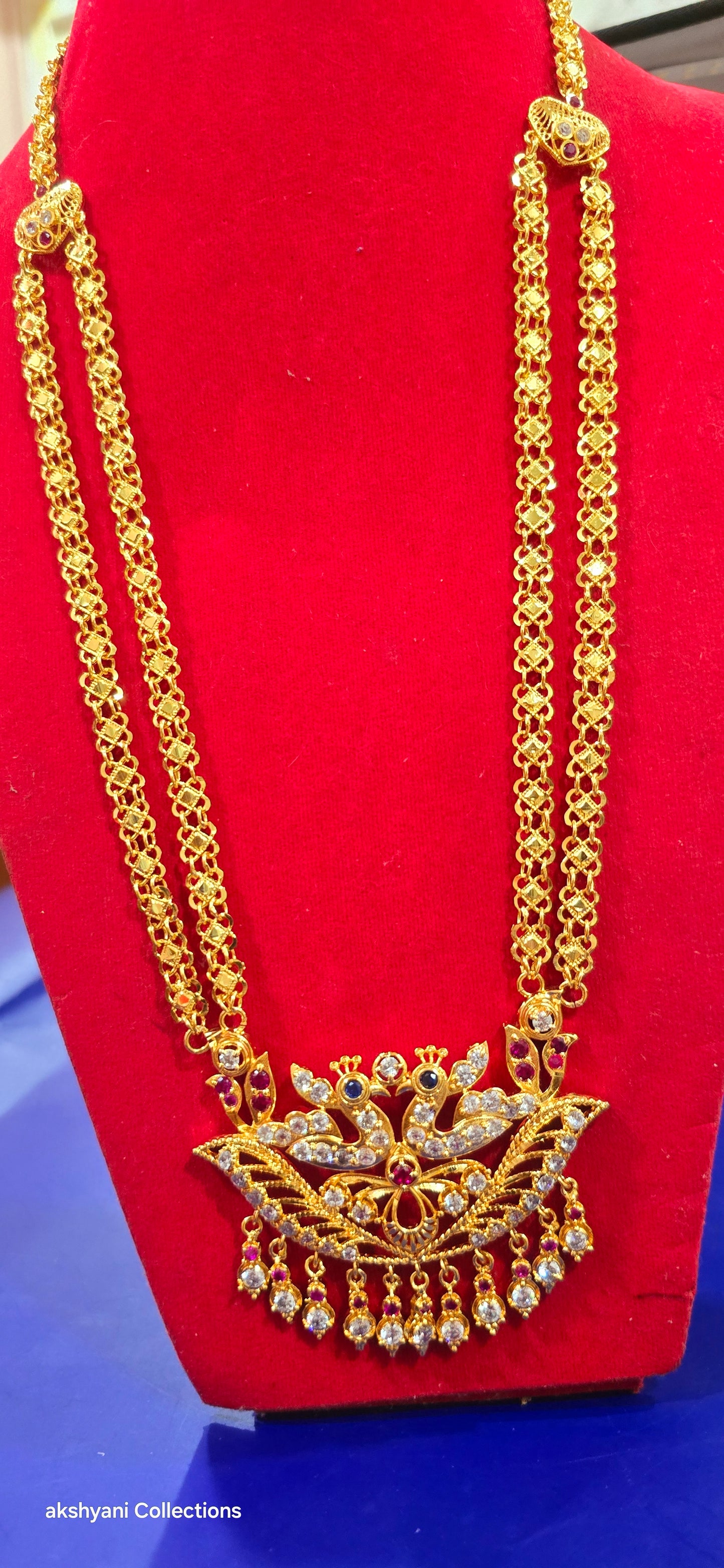 2 layer chain with peacock pendent. Function wear type of jewellery.  28 inches length