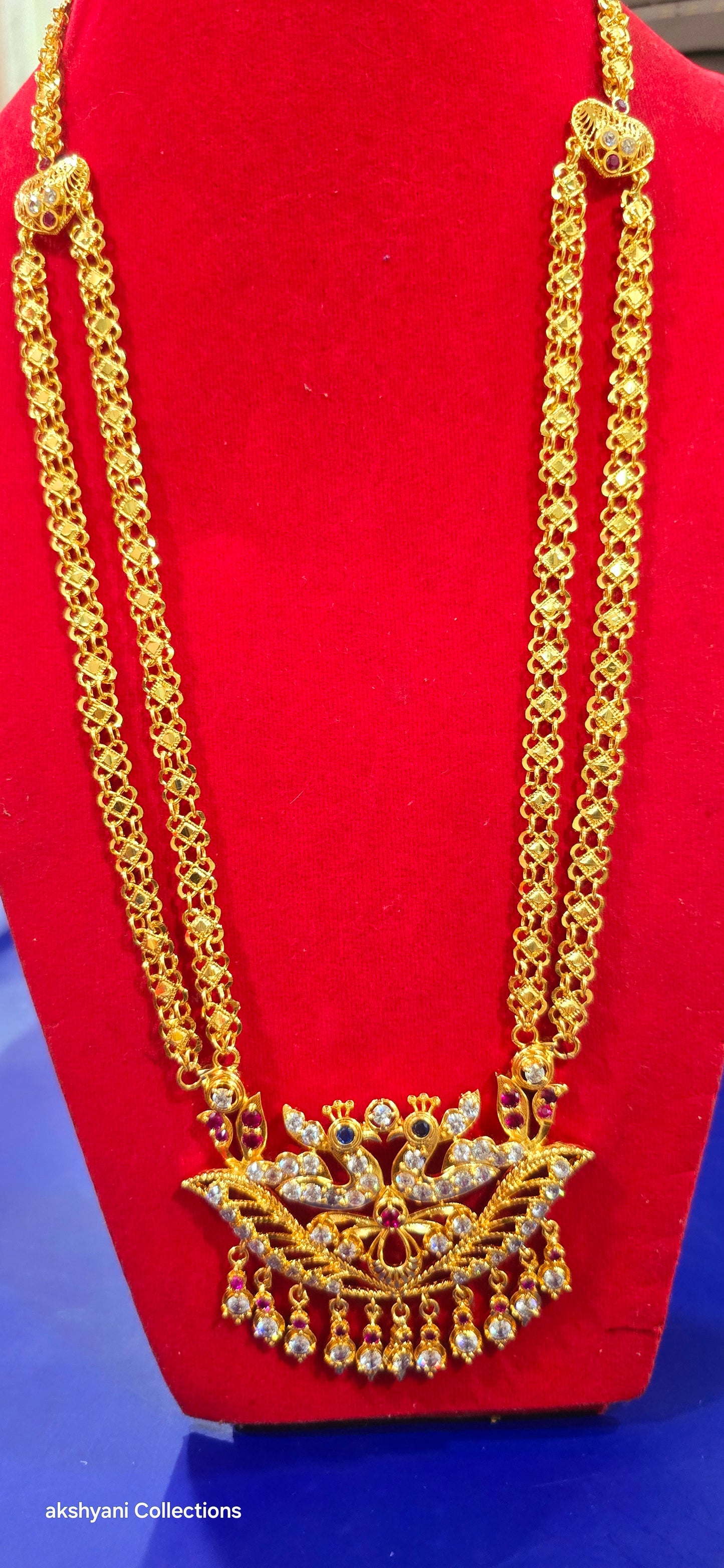 2 layer chain with peacock pendent. Function wear type of jewellery.  28 inches length