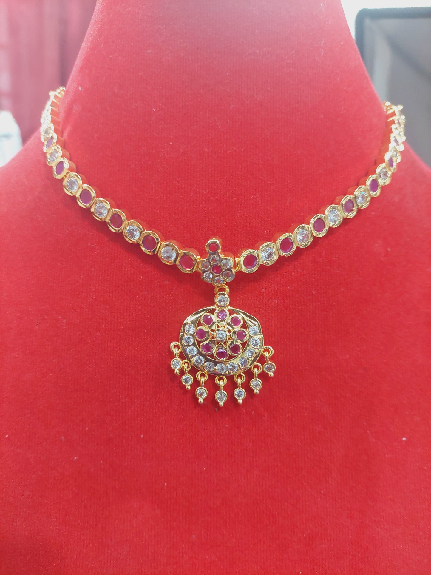 Star cut traditional necklace set with earrings. Not 916 gold. Indian screw.  Behind chain