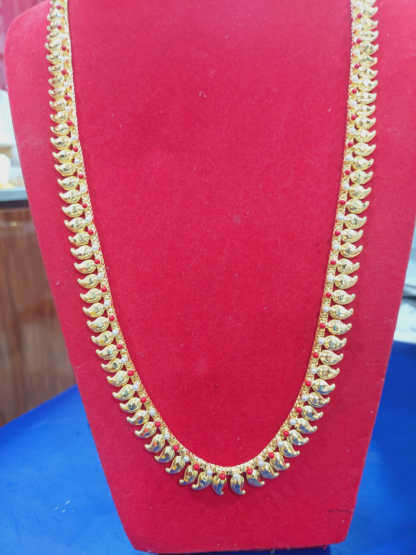 Mango chain not 916 gold. Coral and pearl.