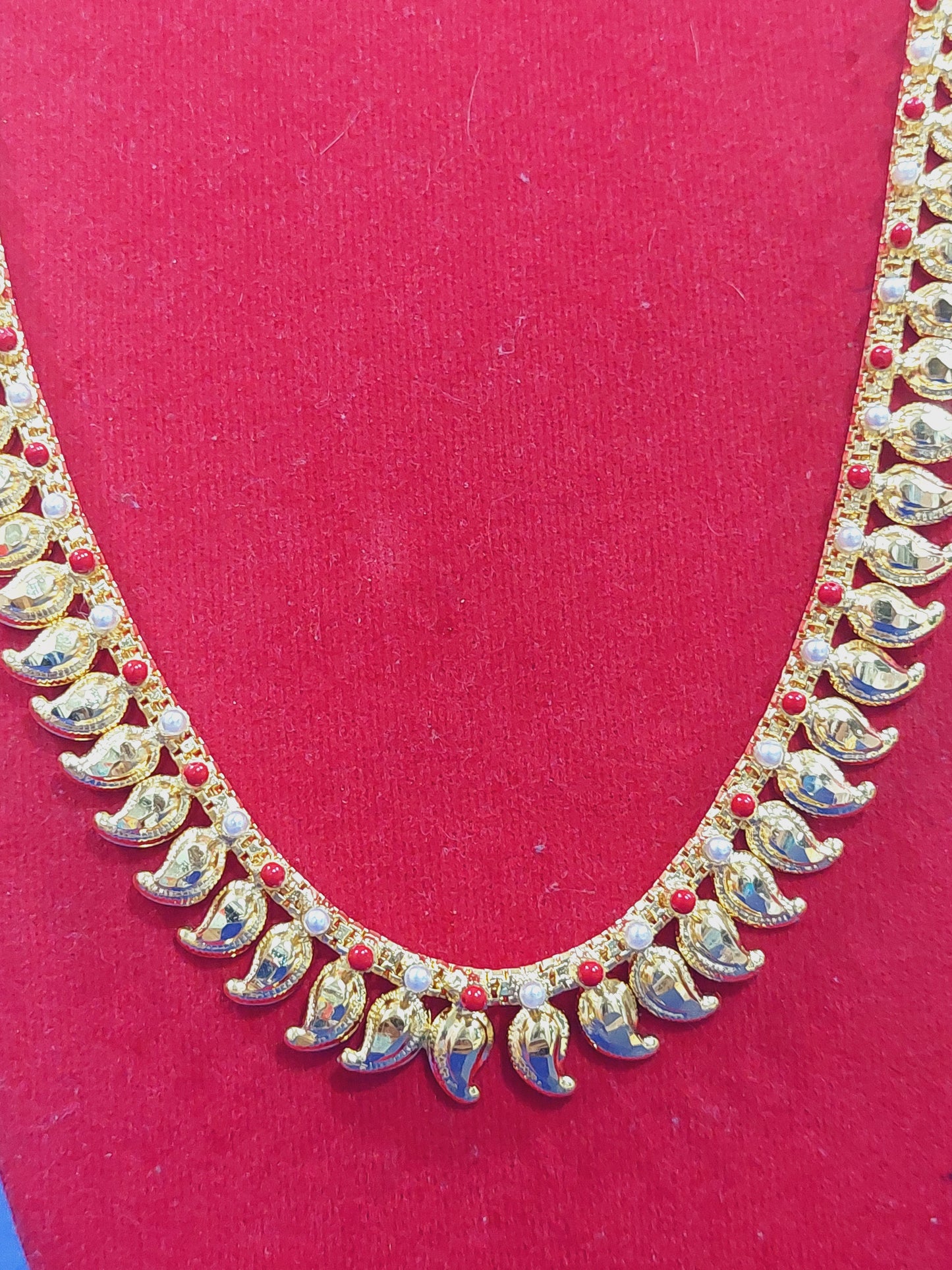 Mango chain not 916 gold. Coral and pearl.