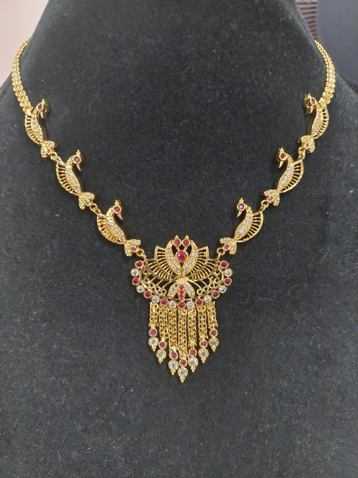 Micron plating peacock necklace with pair of earrings. Indian screw. Not 916 gold.